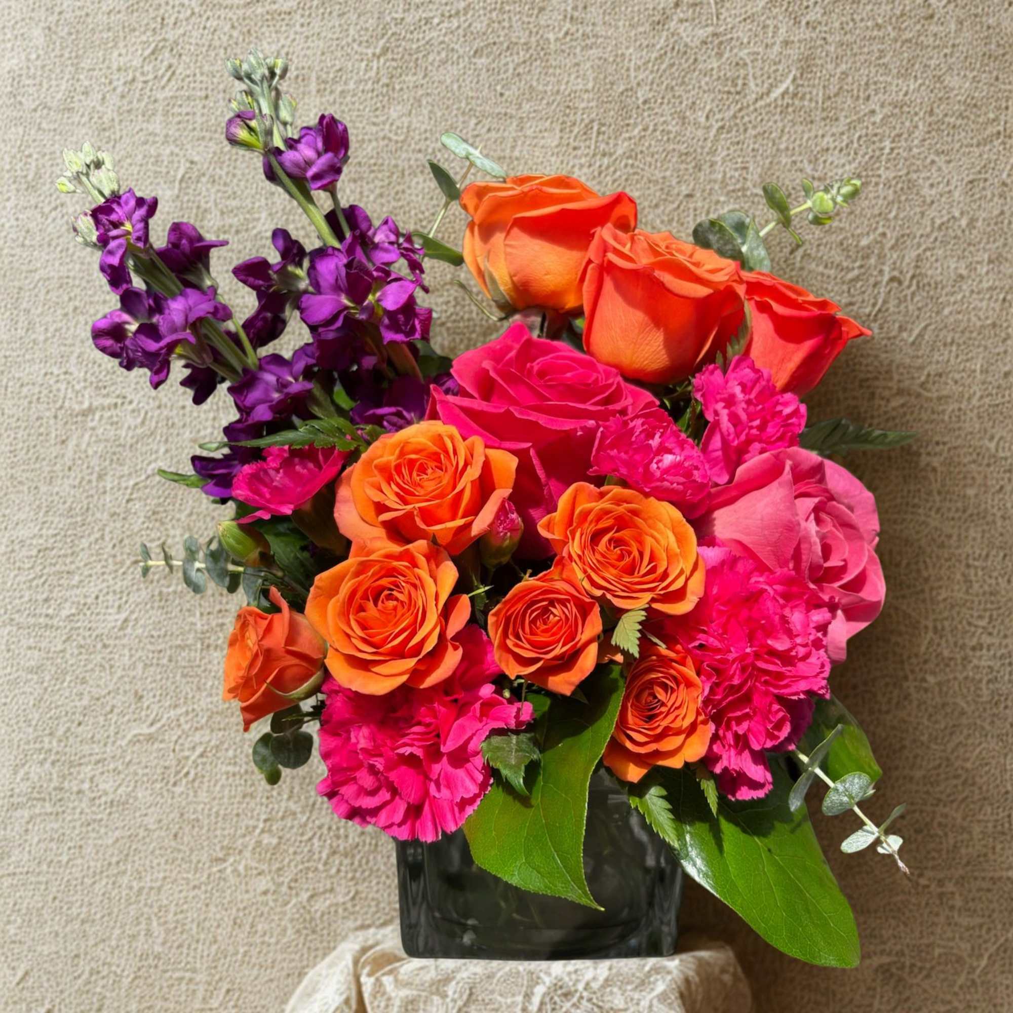 A bold burst of color-this birthday bouquet blends vivid orange and hot