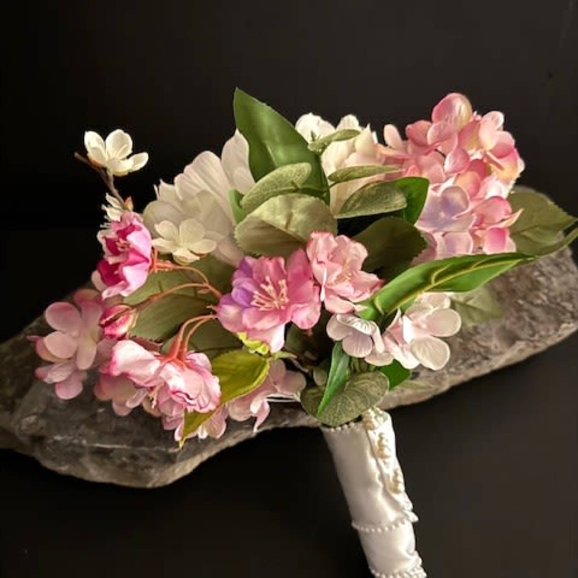 A large ivory peony-style bloom anchors this silk wedding bouquet, its smooth, photo 3 of 3