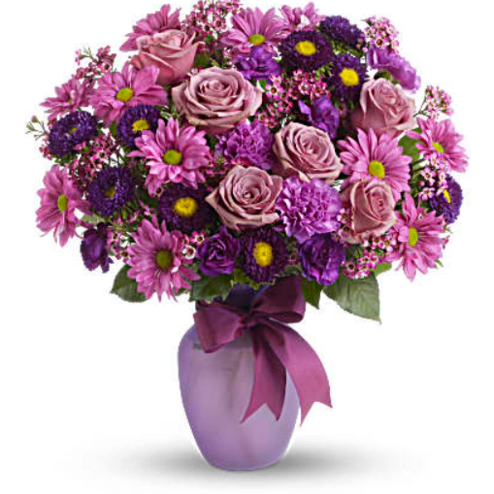 Purple and pink mixed bouquet in a lavender vase with a ribbon