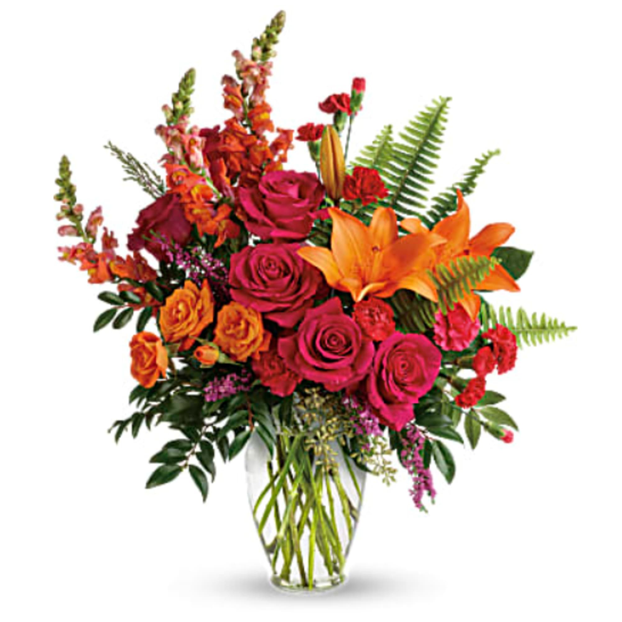 Bouquet of orange lilies and pink roses in a clear glass vase