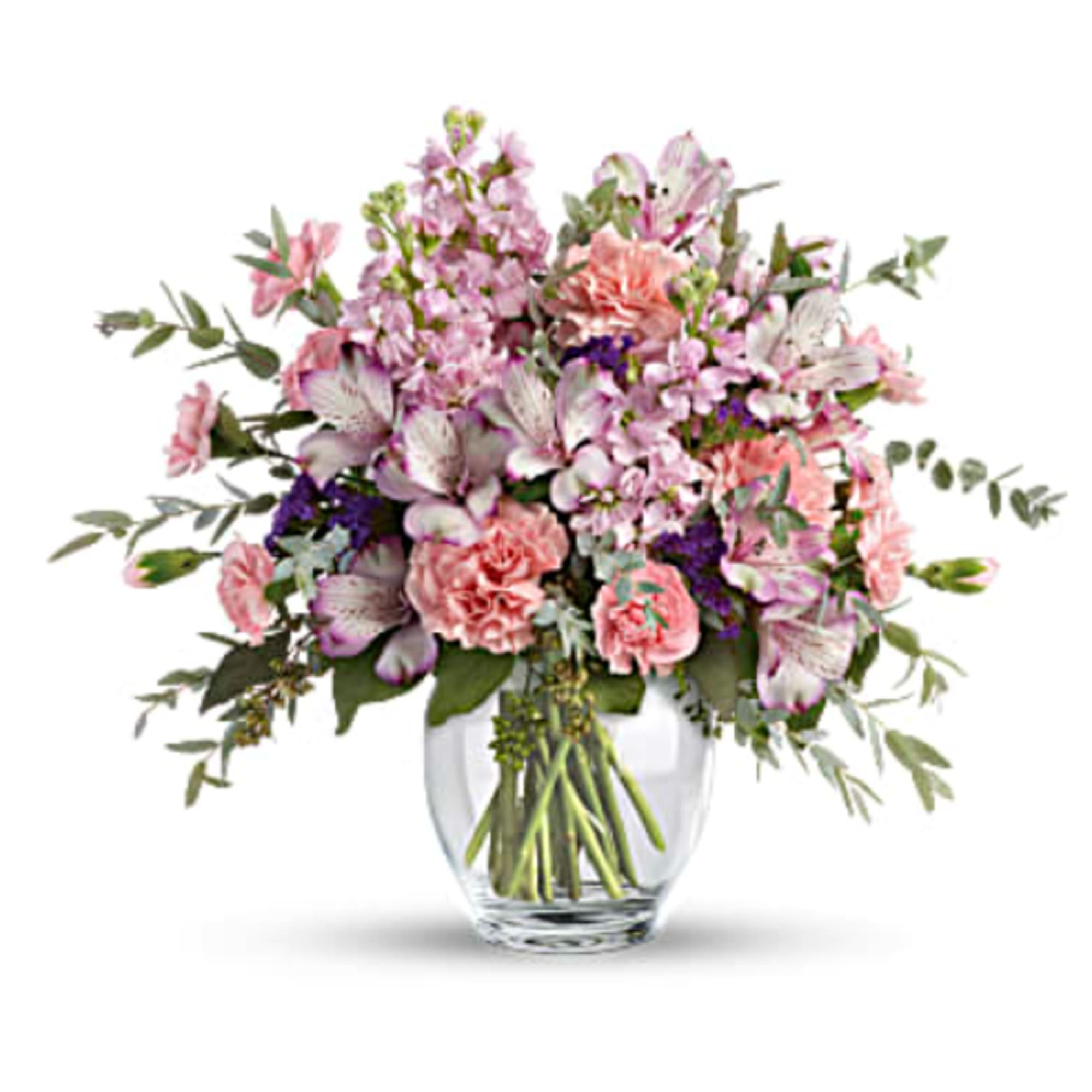 Pink and white mixed bouquet in a clear glass vase