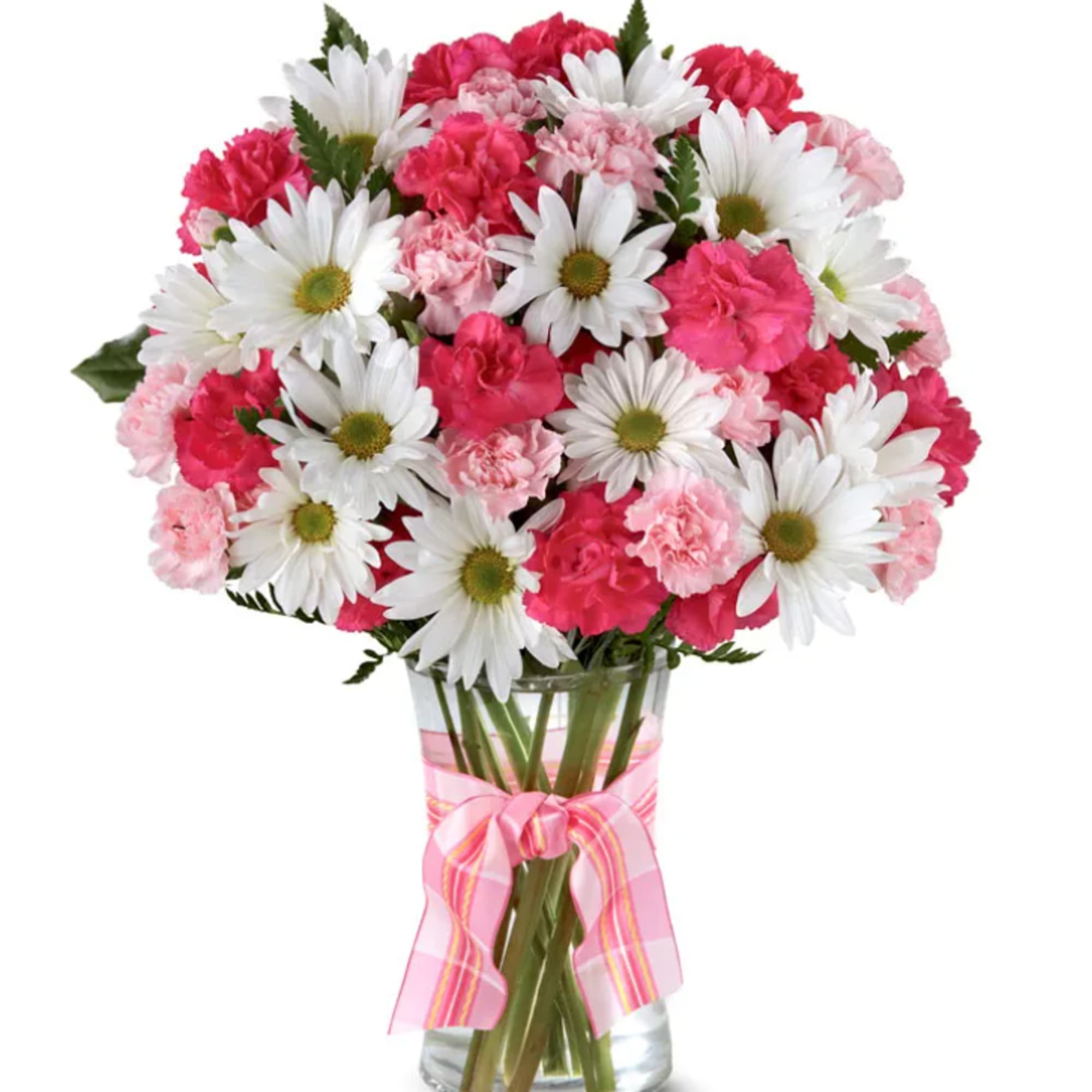 Pink carnations and white daisies in a glass vase with a pink ribbon