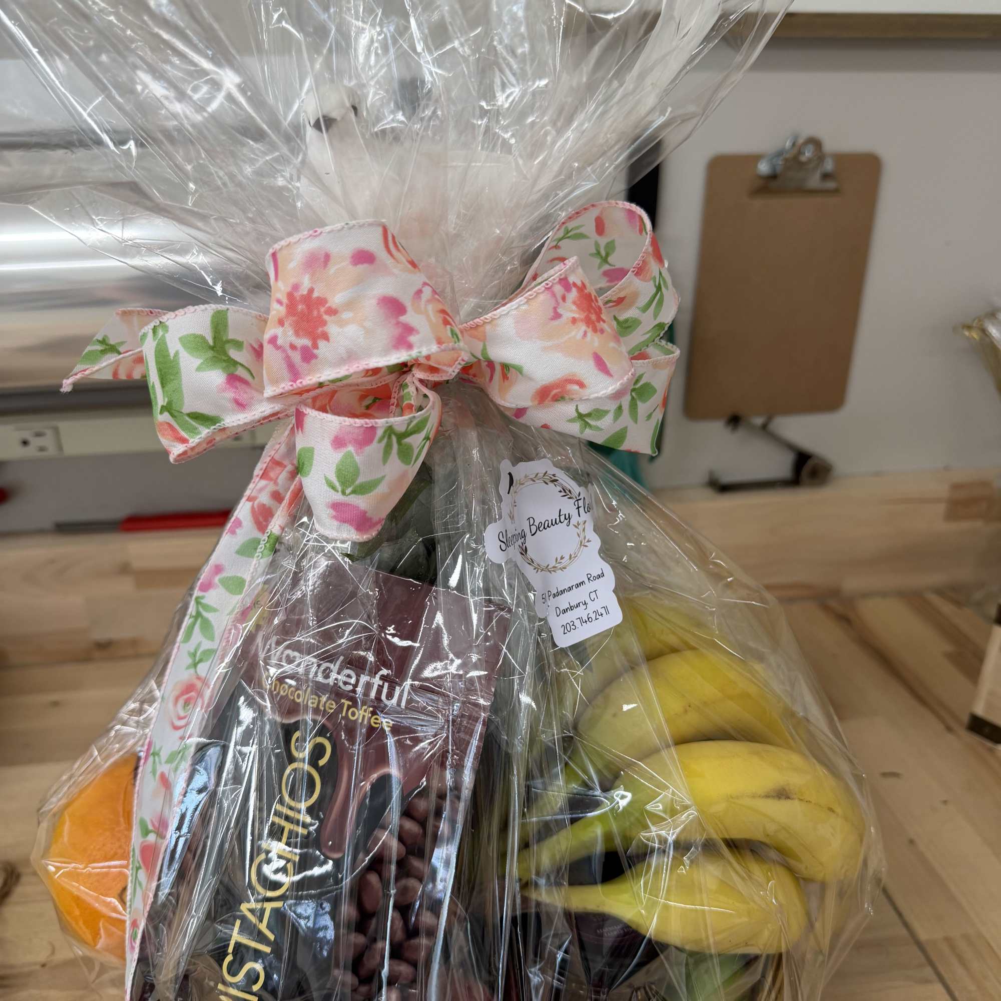 12-inch basket filled with assorted fruits, nuts, and other treats.  Perfect