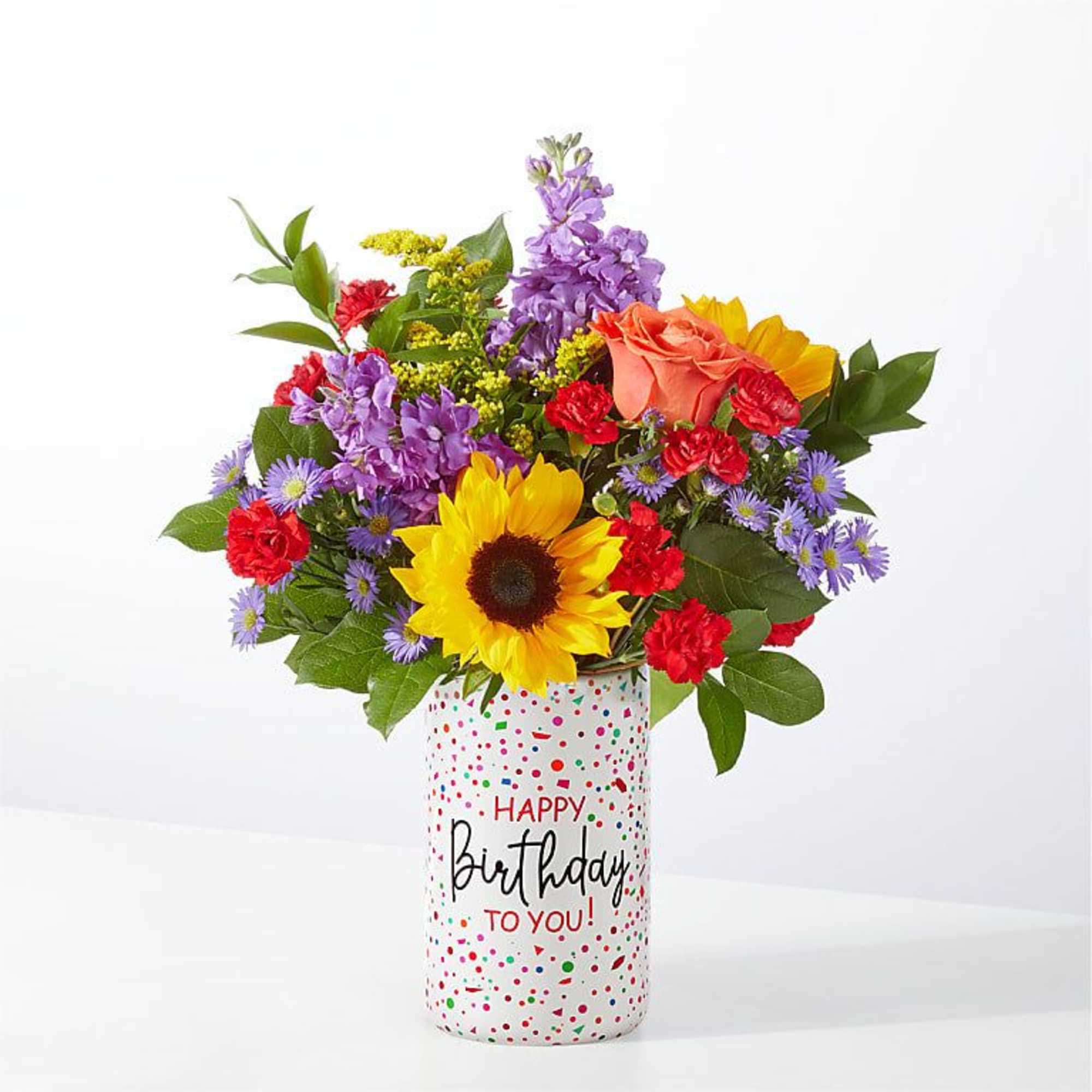 Colorful mixed bouquet in a birthday vase