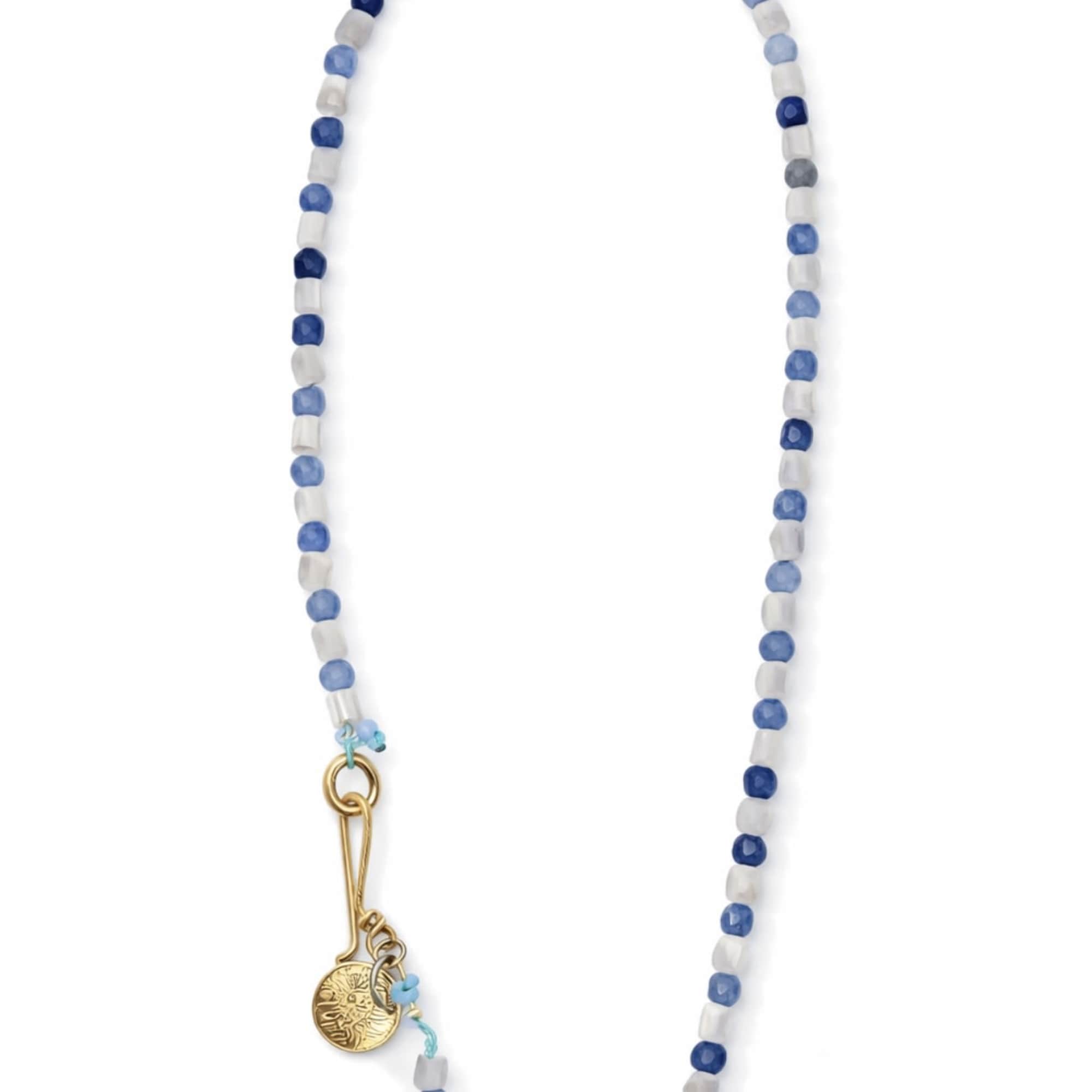 Blue and white beaded necklace with a gold clasp and charm