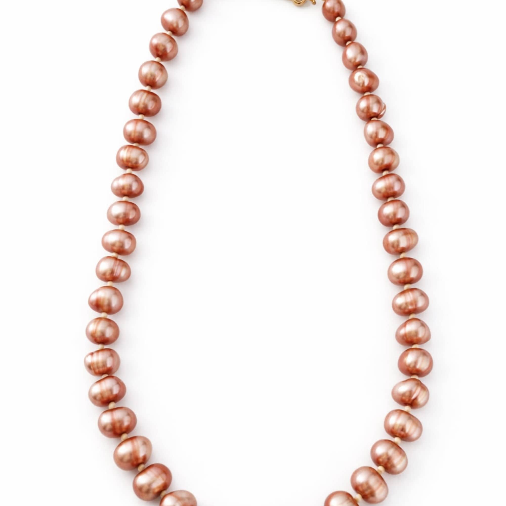 Pink pearl bead necklace with a gold clasp on a white background