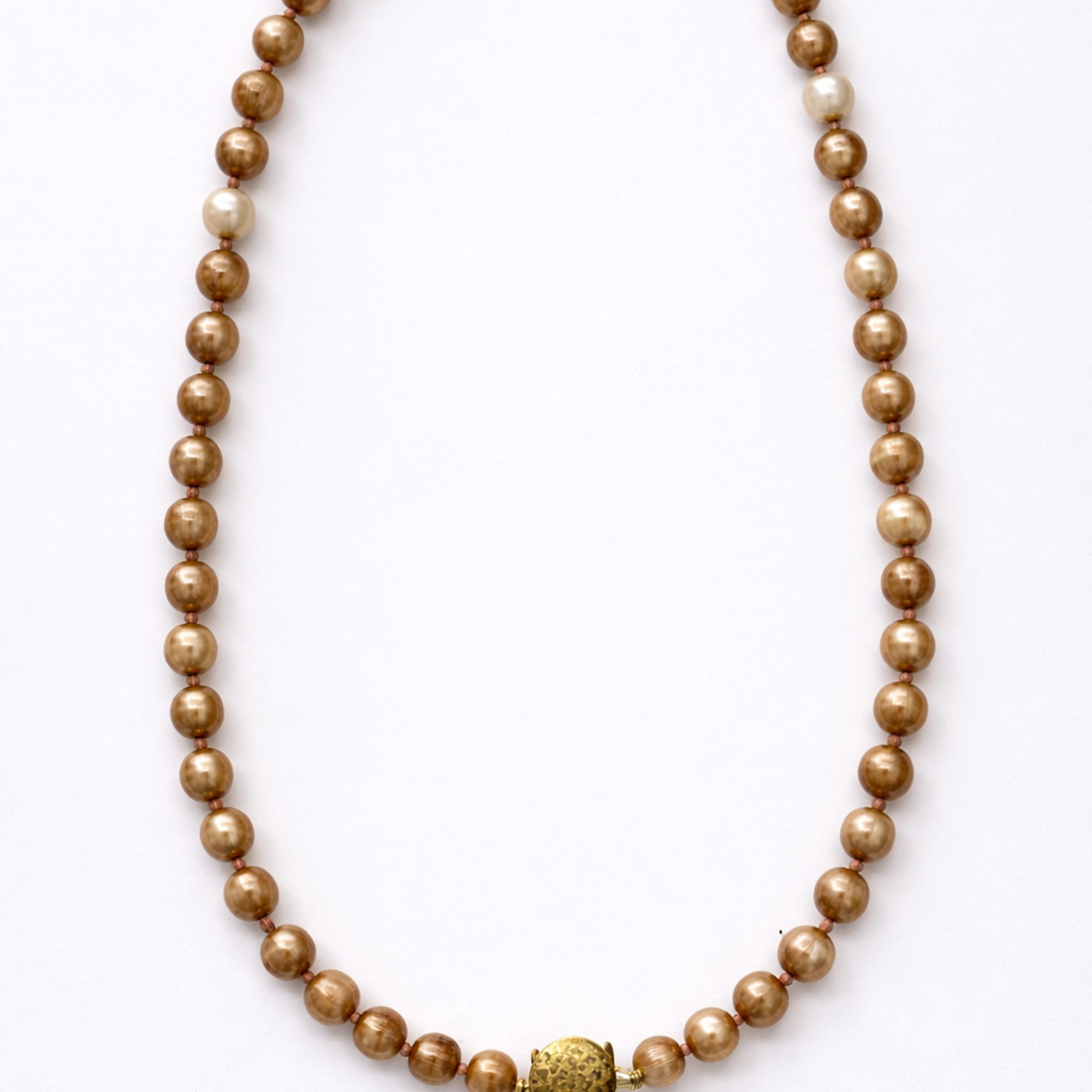 Gold beaded necklace on a white background