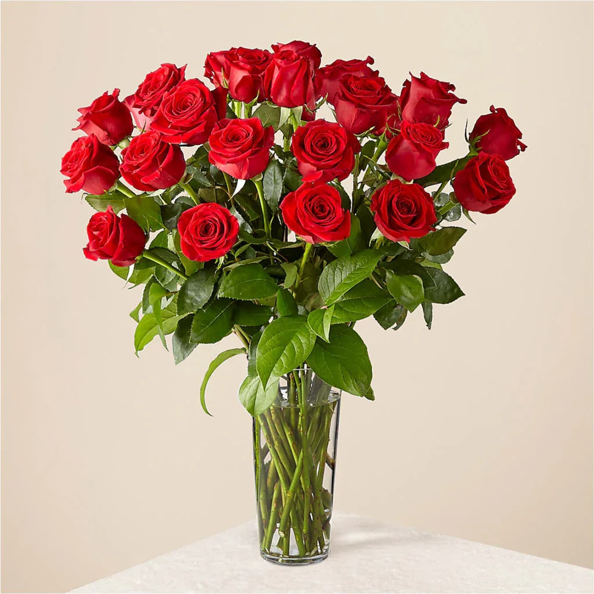 Bouquet of red roses in a clear glass vase