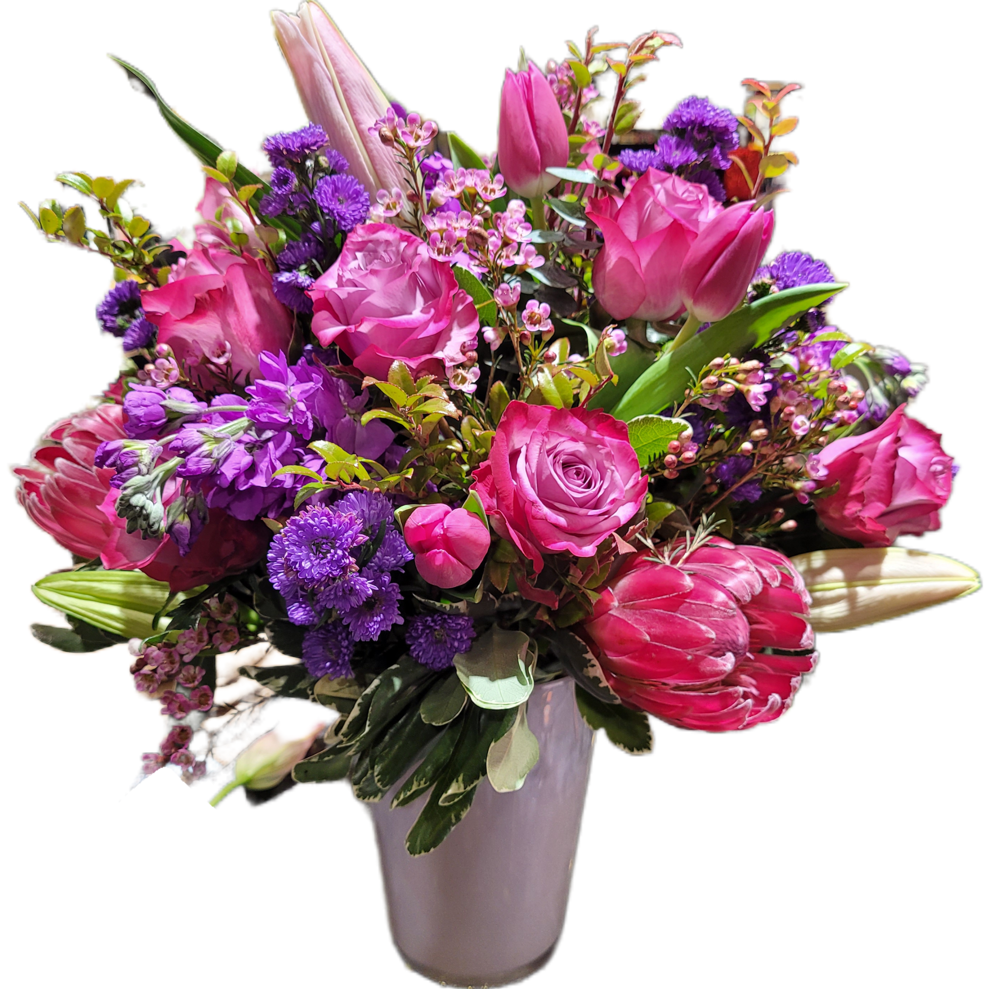 Custom arrangement featuring in season florals. All Custom orders please leave message