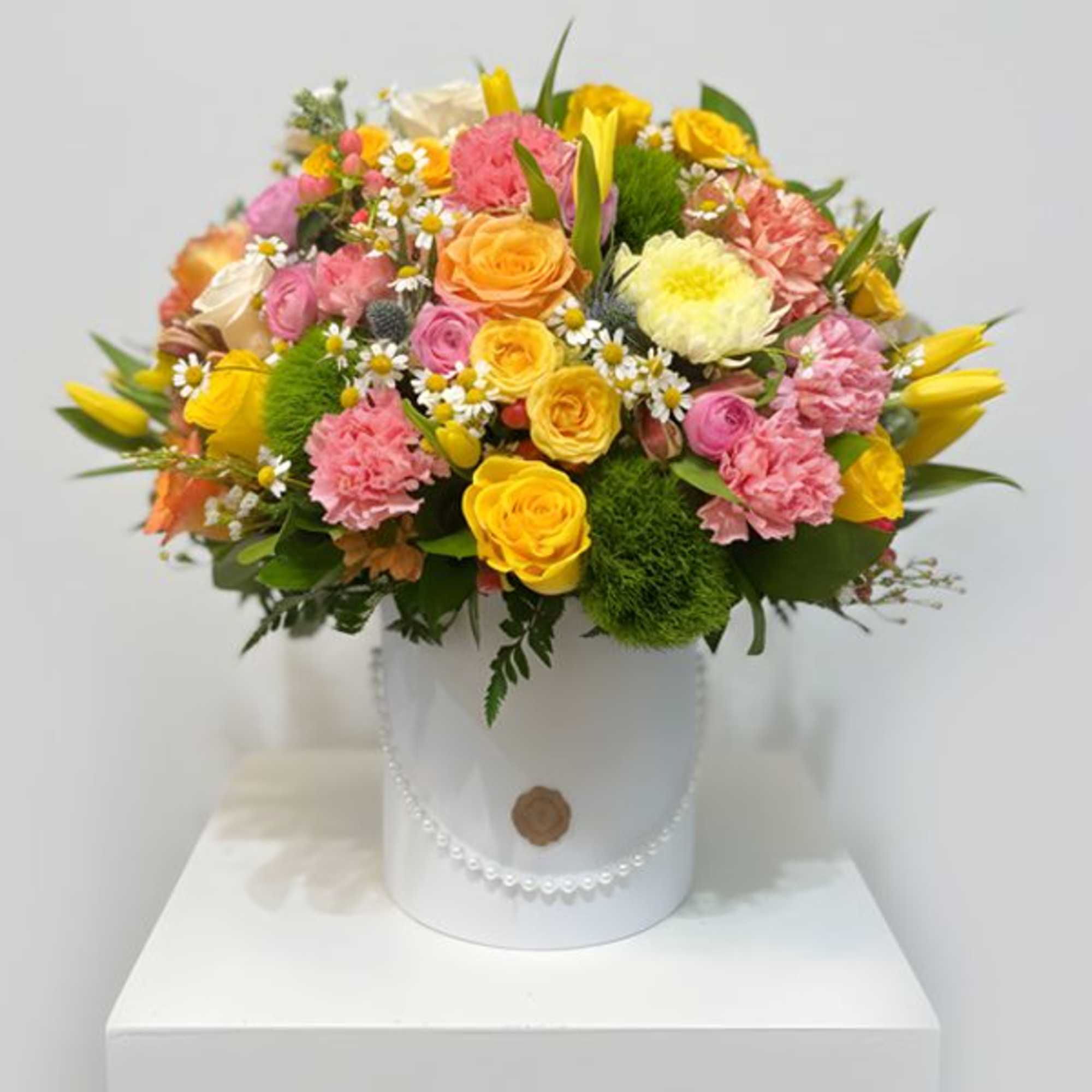 A bright, rounded hatbox of pastel cheer that makes someone feel truly