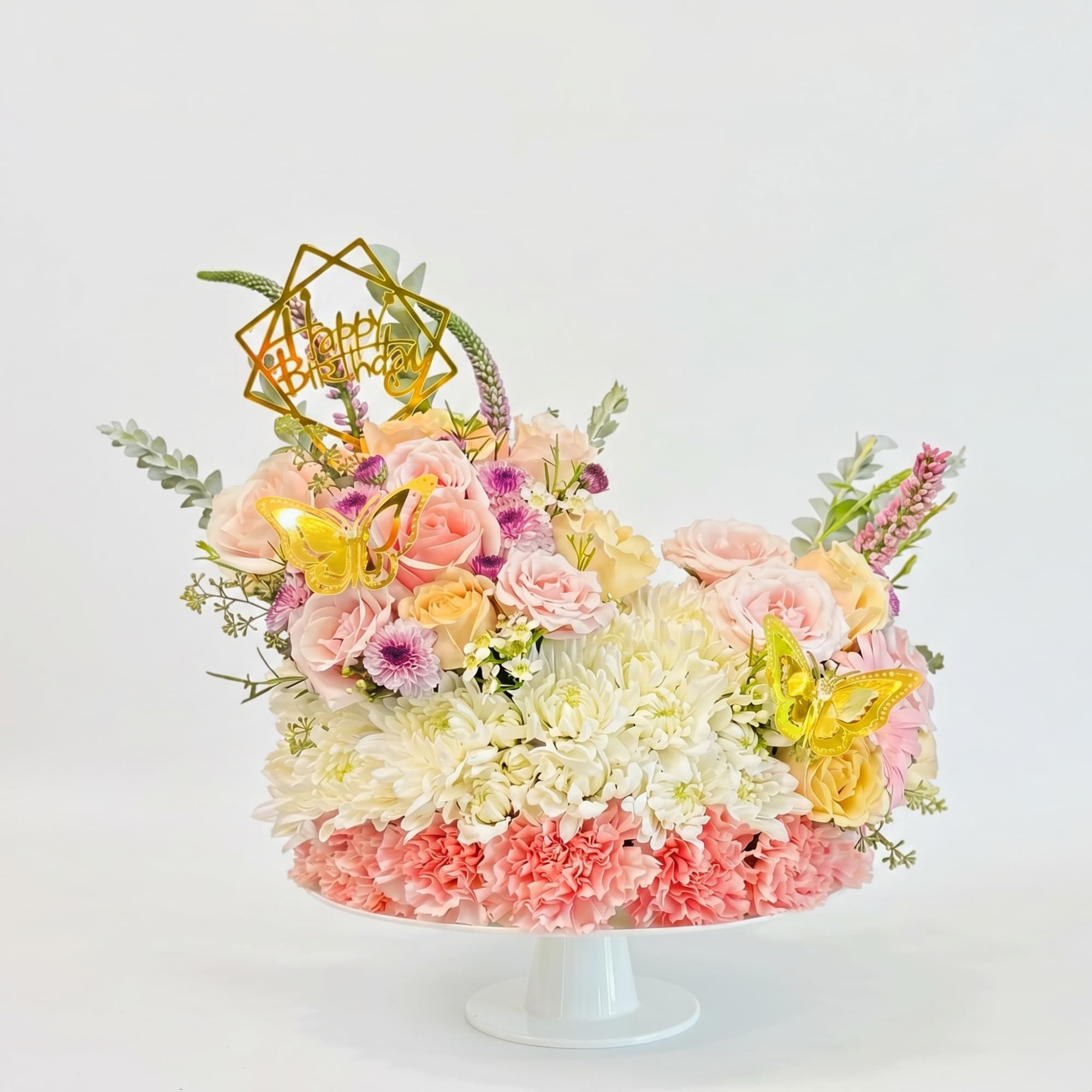 Pastel bands of pale pink carnations, blush roses, and creamy white chrysanthemums, photo 2 of 4