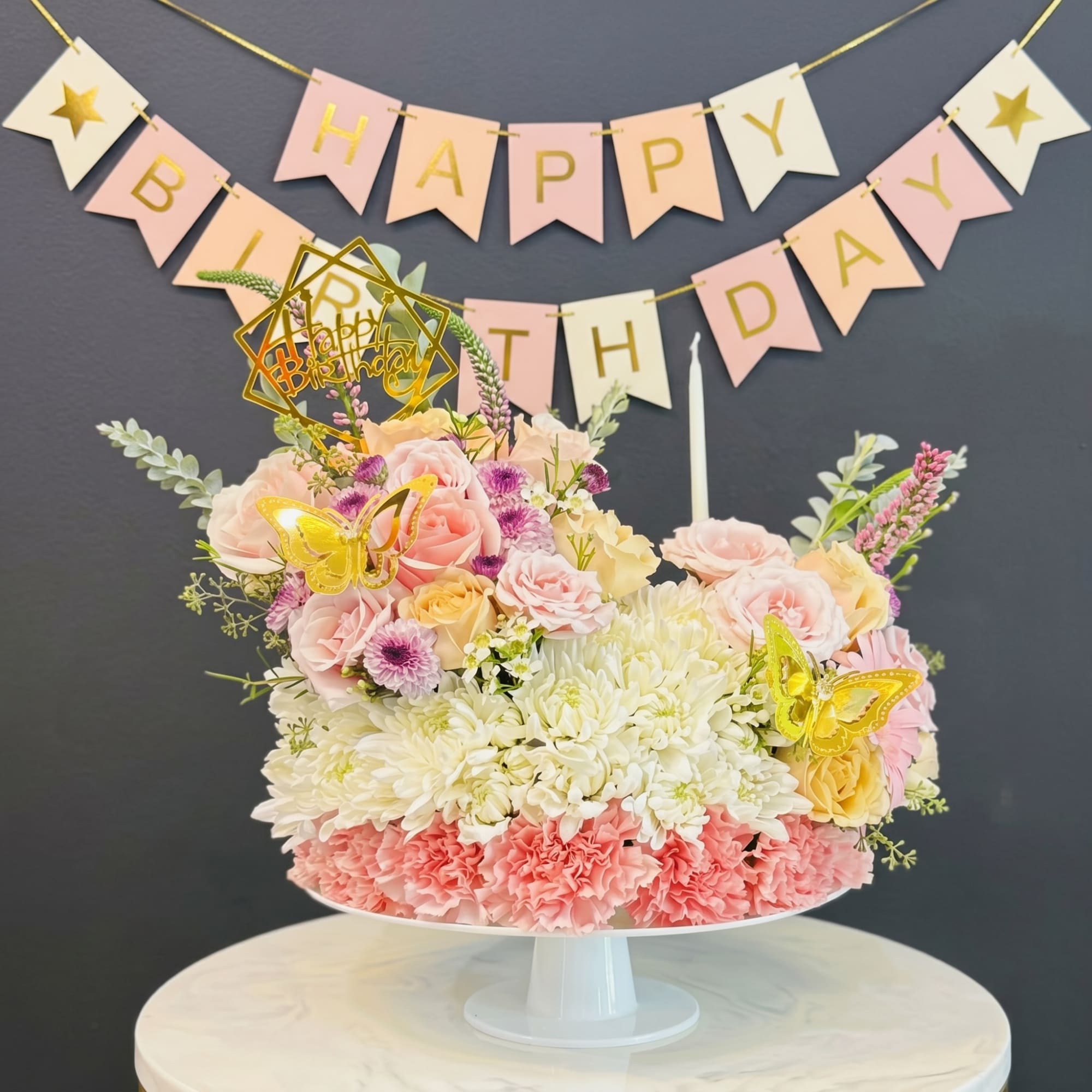 Pastel bands of pale pink carnations, blush roses, and creamy white chrysanthemums, photo 3 of 4