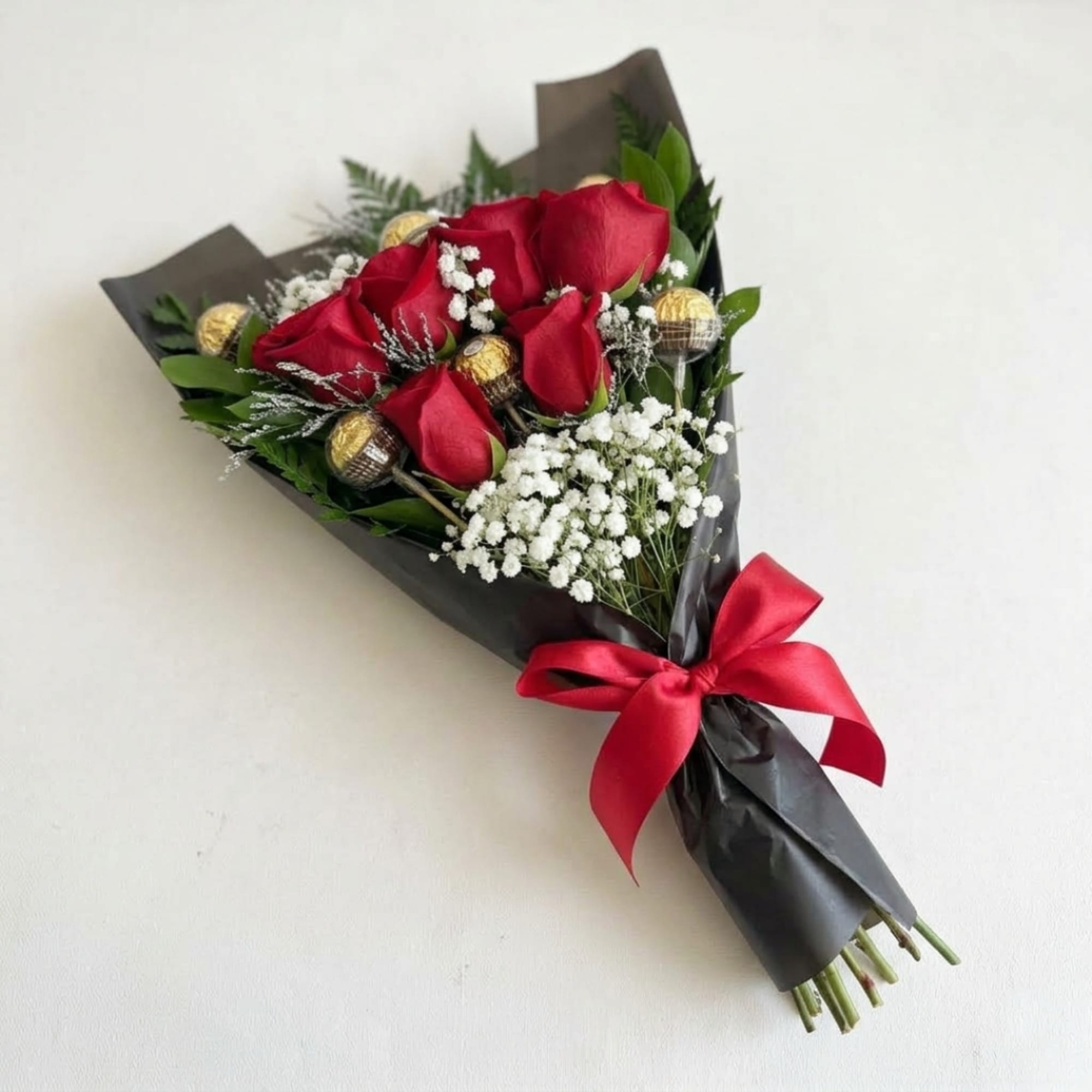 Bouquet of red roses with white baby's breath and gold-wrapped chocolates, photo 3 of 4