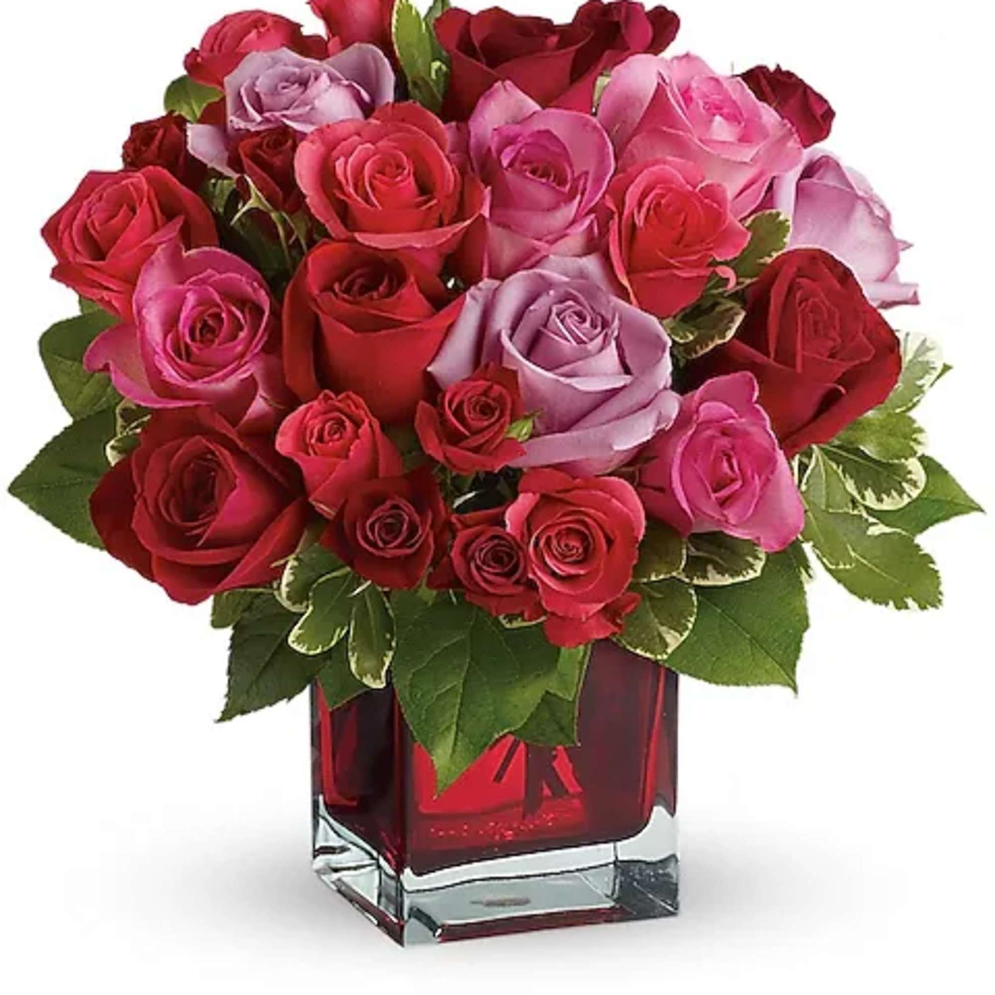 Bouquet of pink, red, and lavender roses in a red glass vase