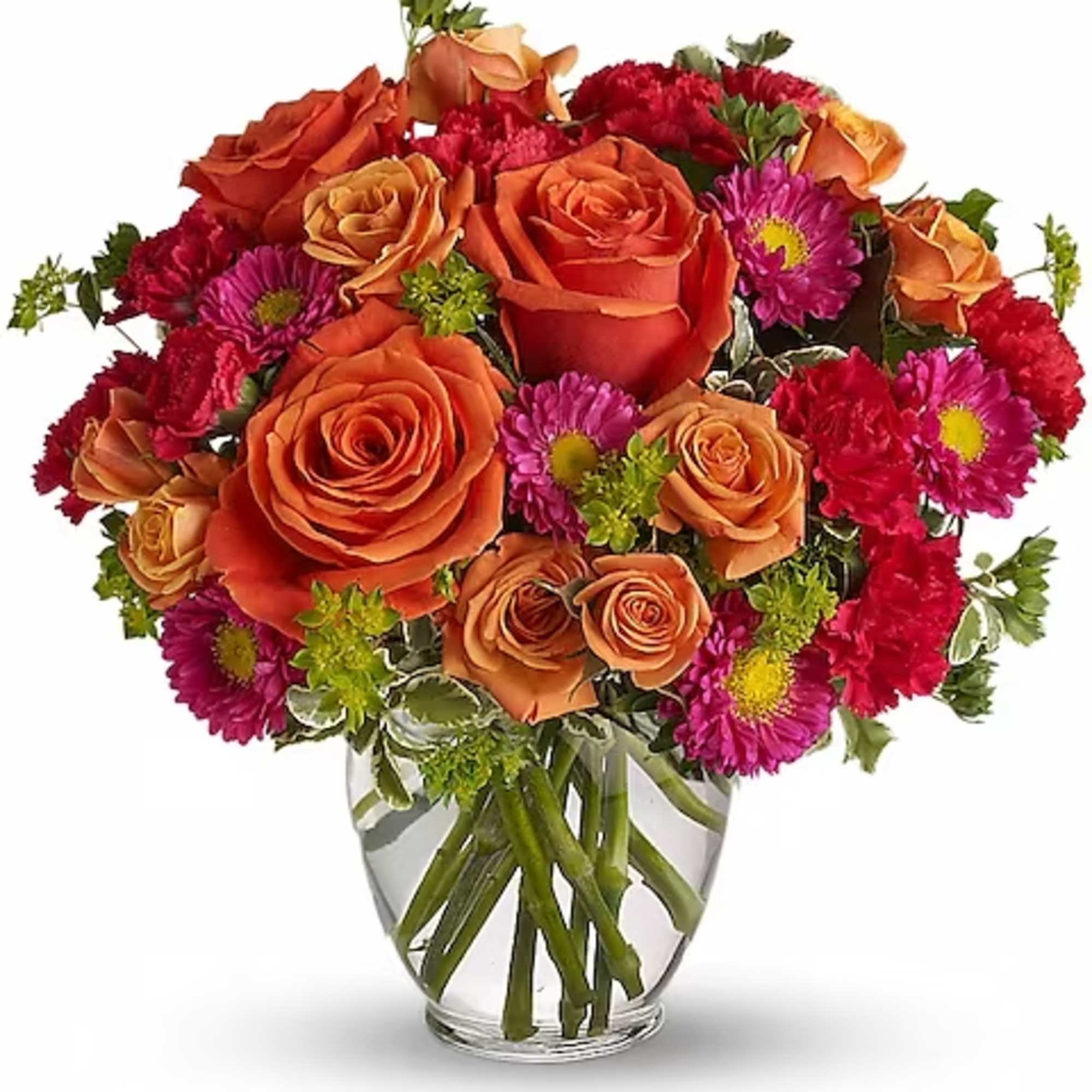 Orange roses and pink daisies arranged in a clear glass vase