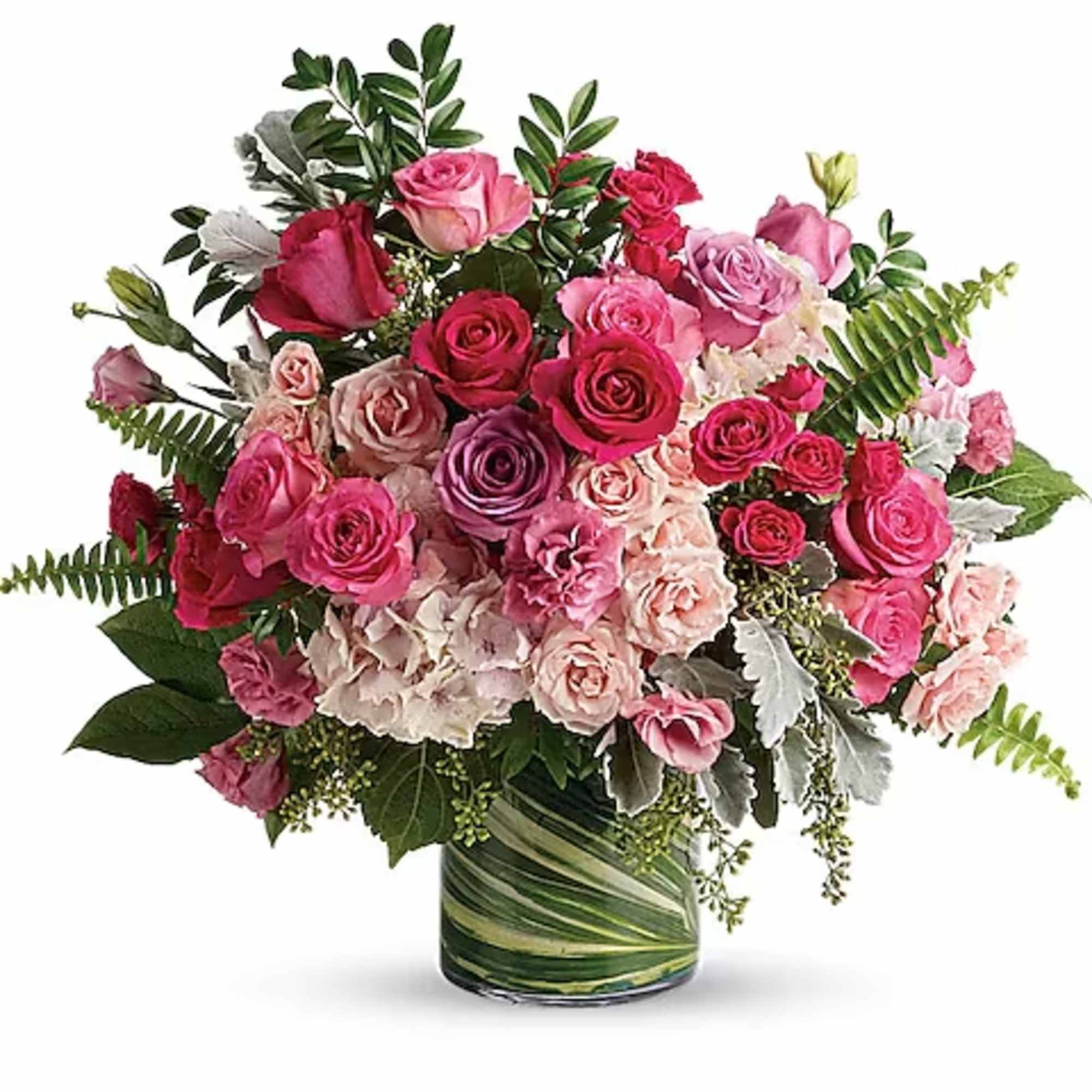 Pink and red rose bouquet in a glass vase