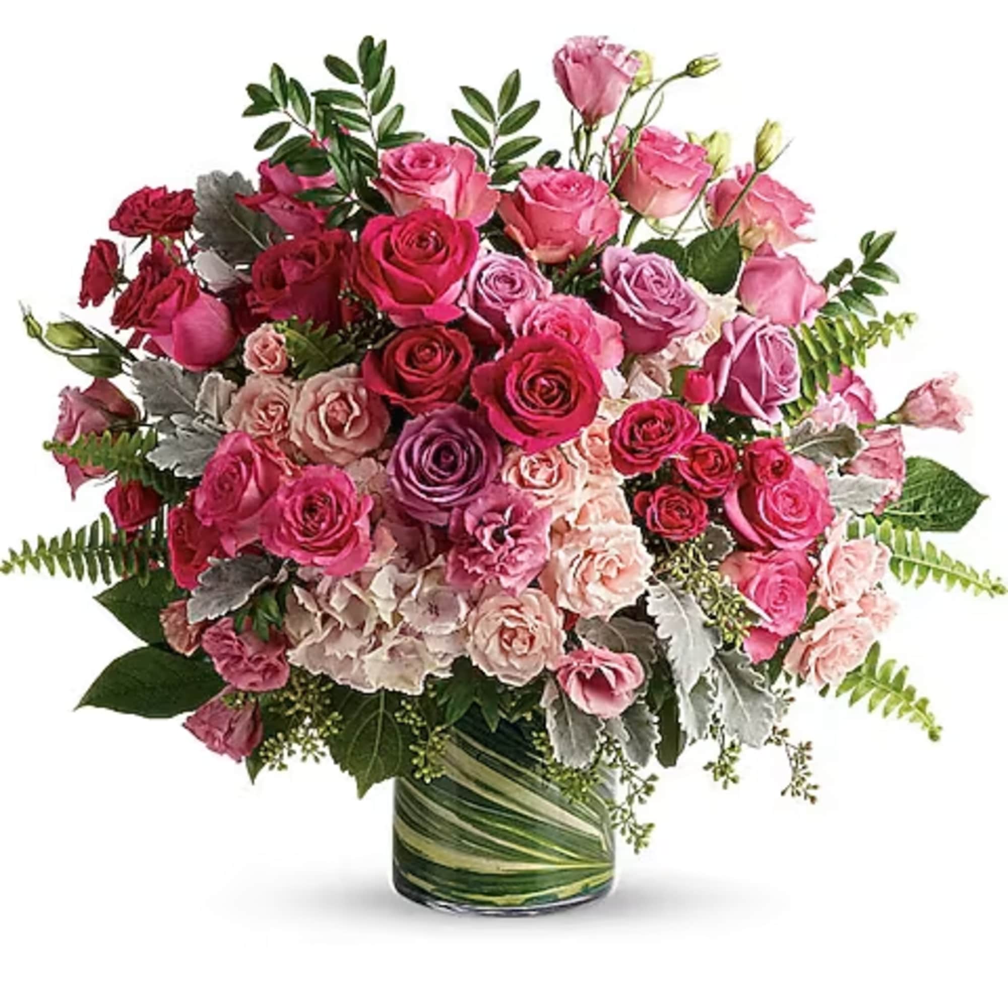 Pink and red rose bouquet in a glass vase