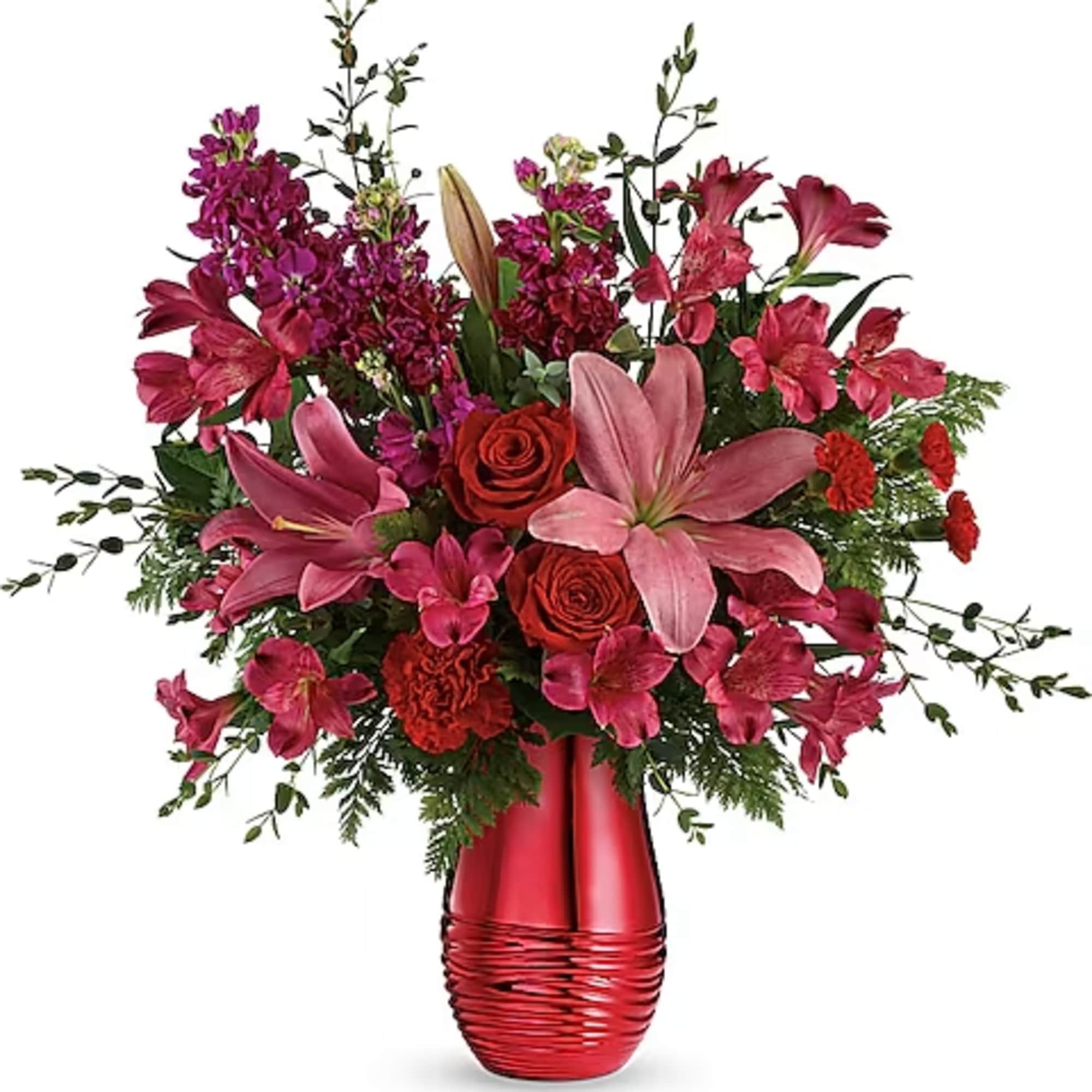 Pink and red mixed flower arrangement in a red vase