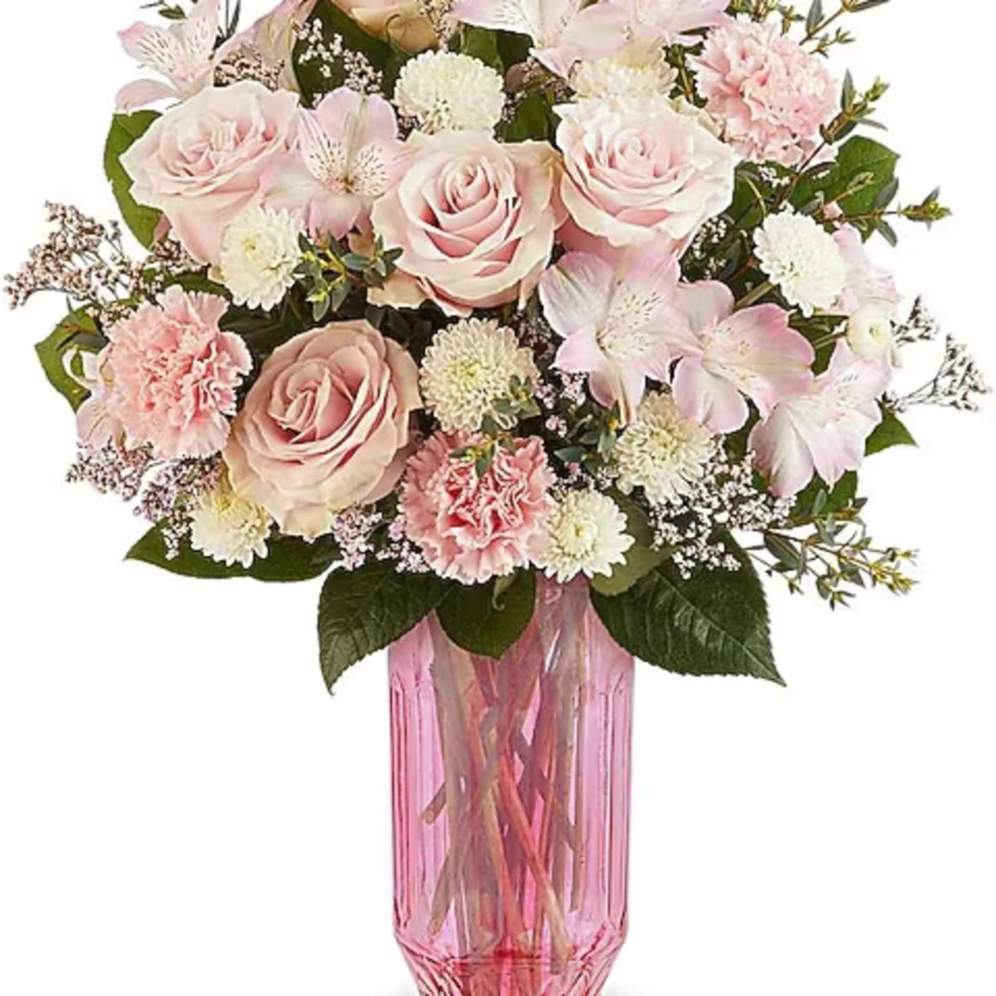 Pink and white mixed bouquet in a tall pink glass vase