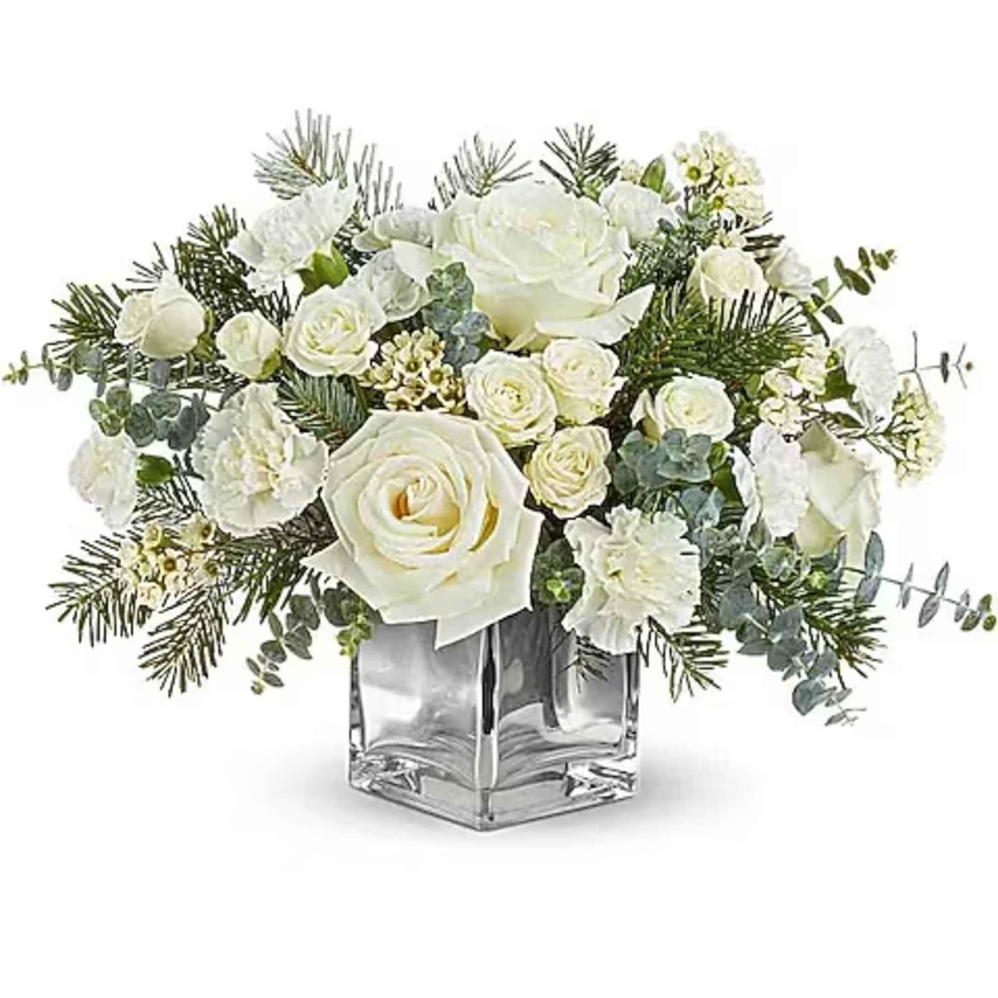 White roses and carnations in a clear square vase