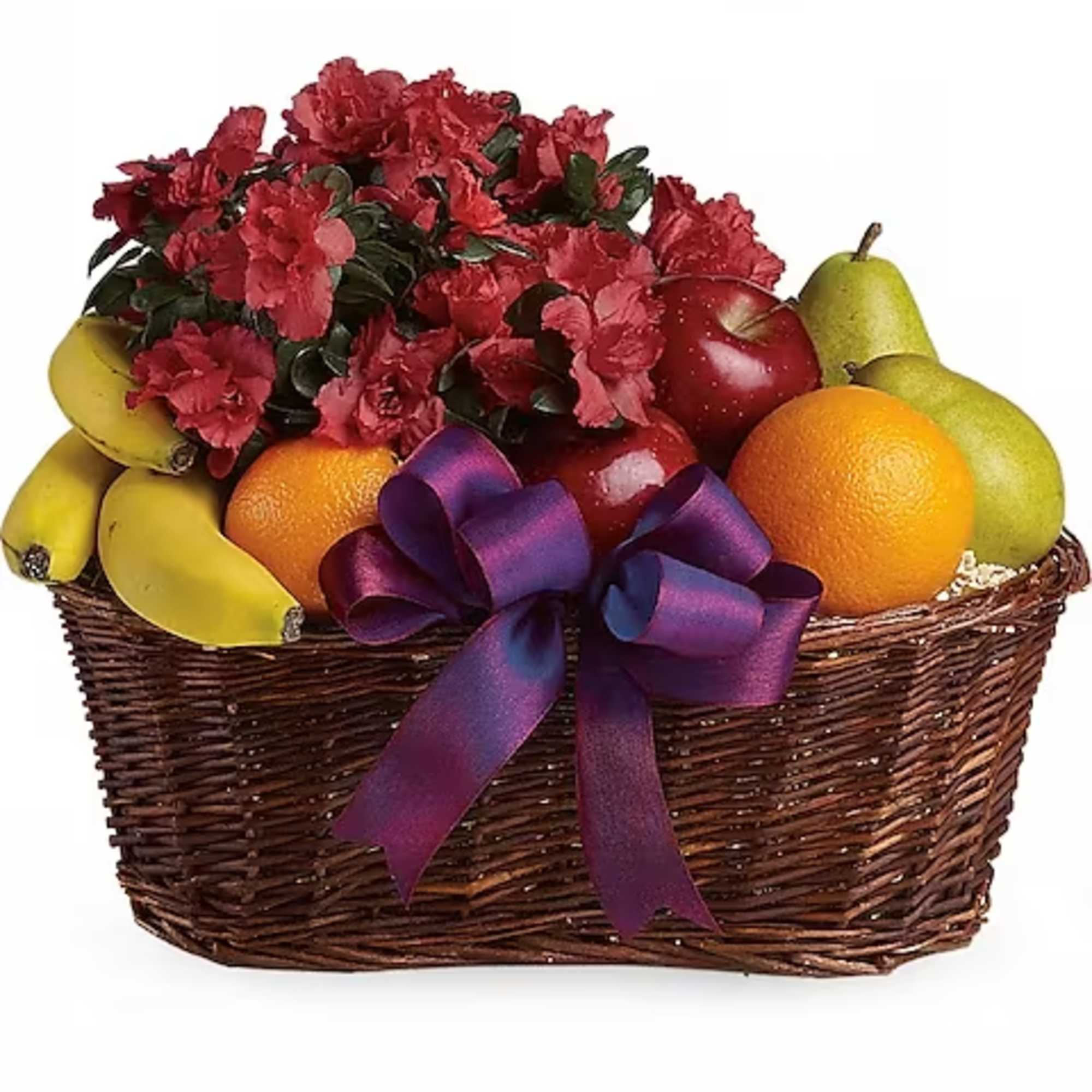 Basket of red flowers with assorted fruit and a purple ribbon