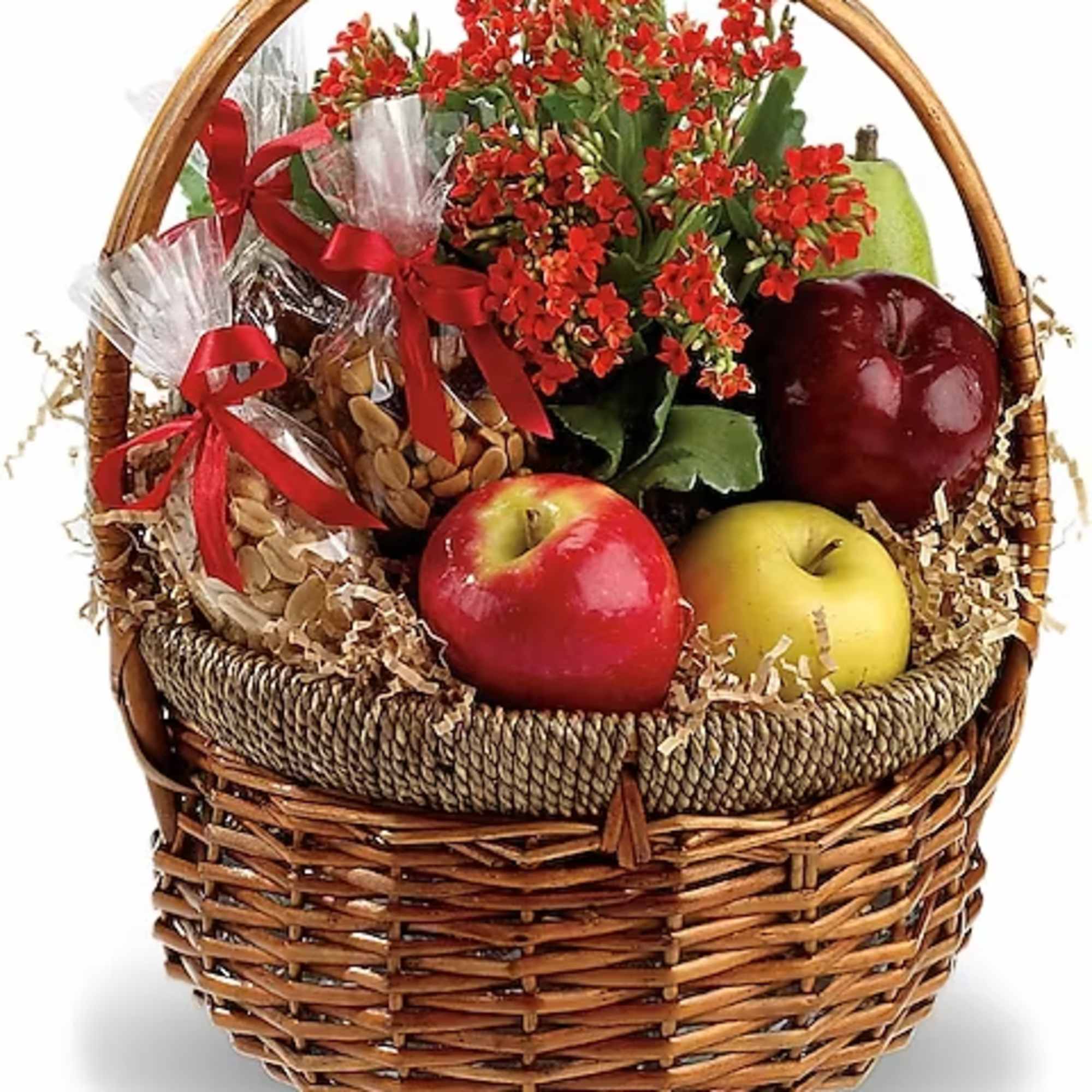 Fruit basket with red flowers and wrapped snacks