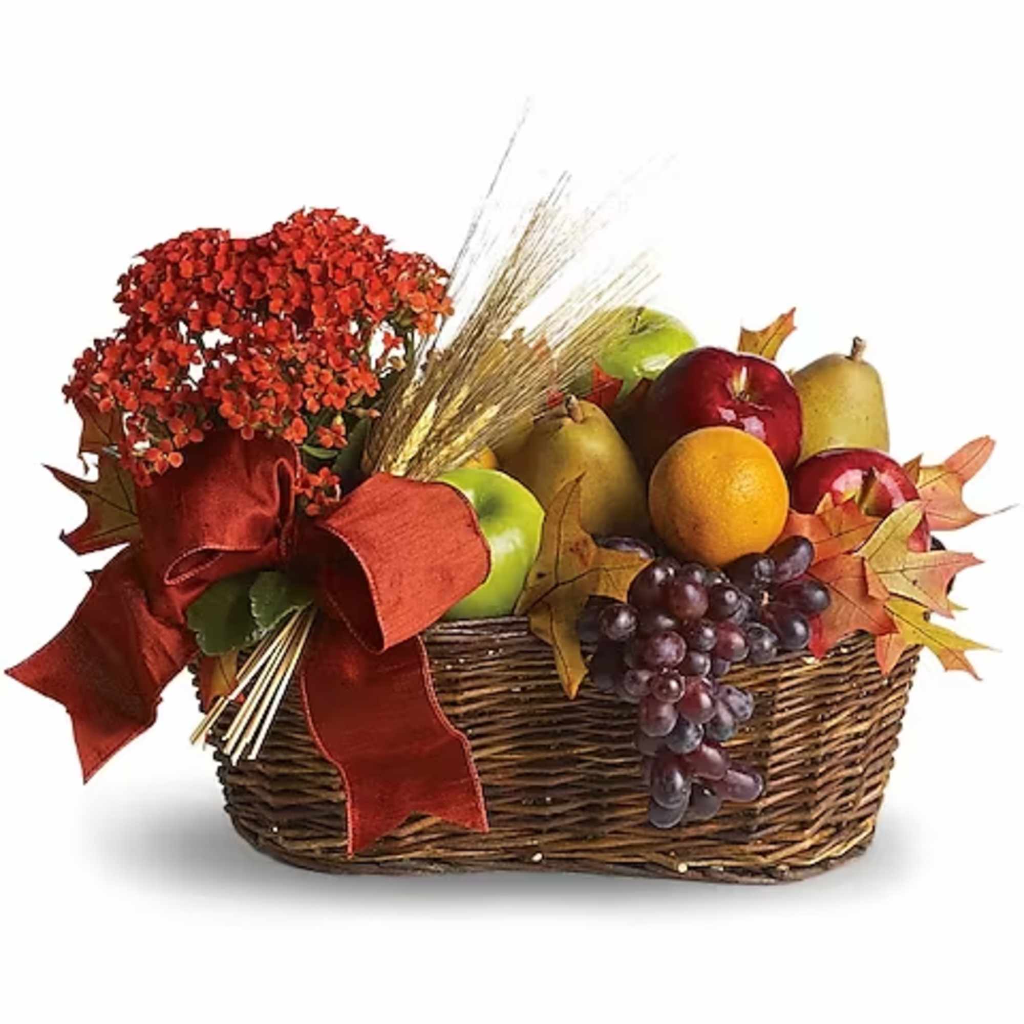 Autumn gift basket with flowers, fruit, and a red ribbon