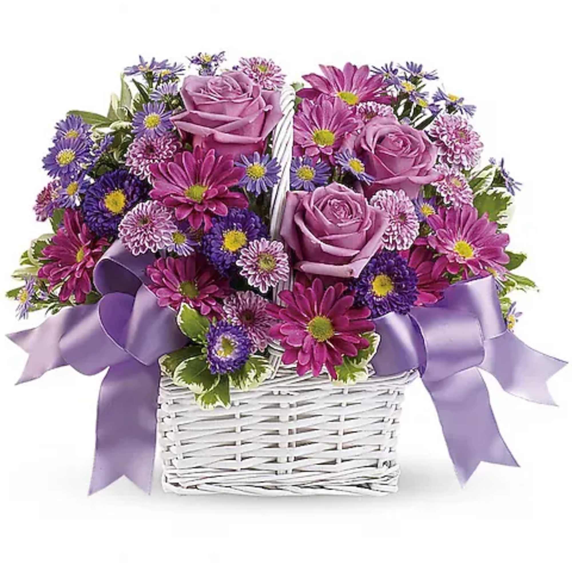 Lavender roses and purple daisies in a white basket with ribbon