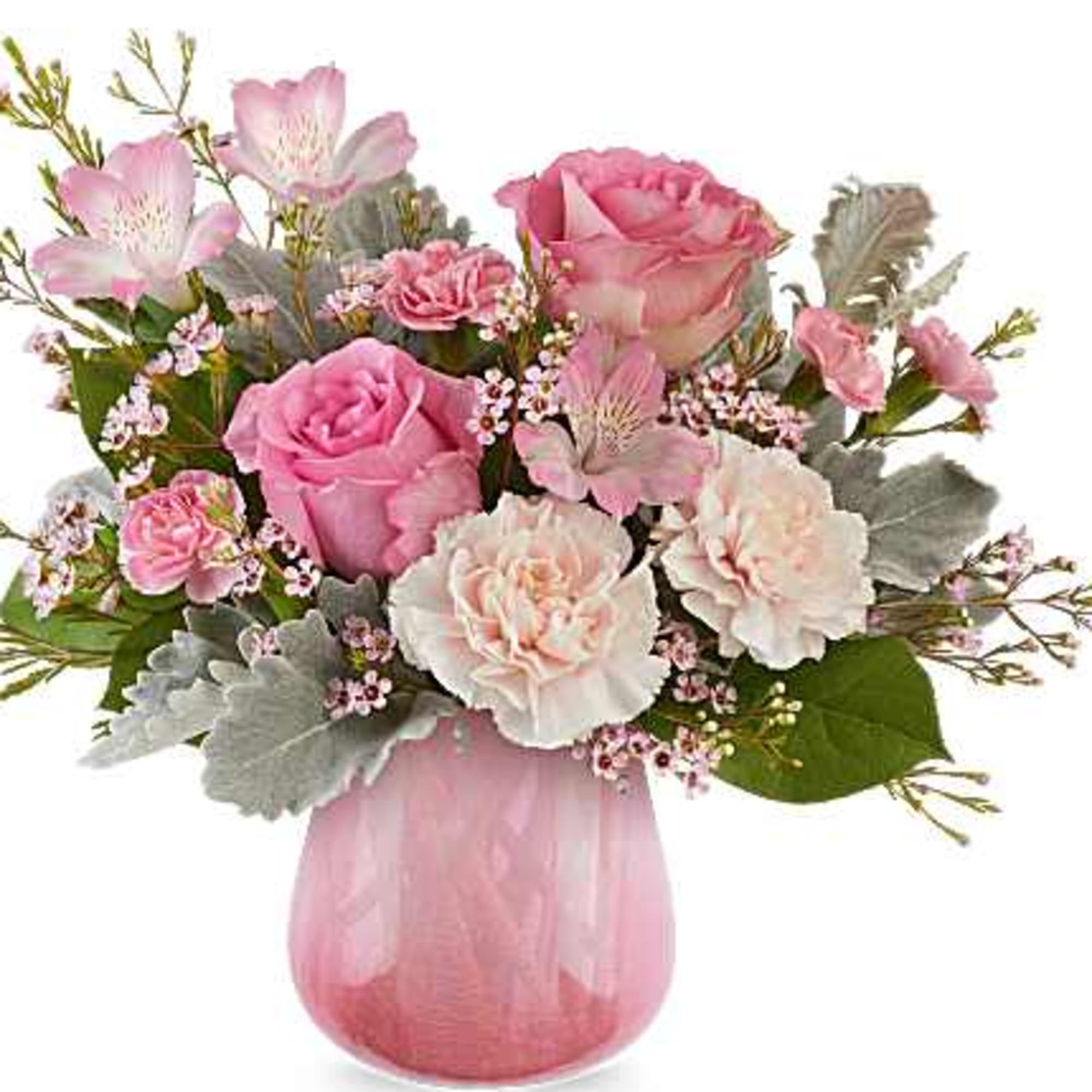 Pink roses and carnations in a pink glass vase