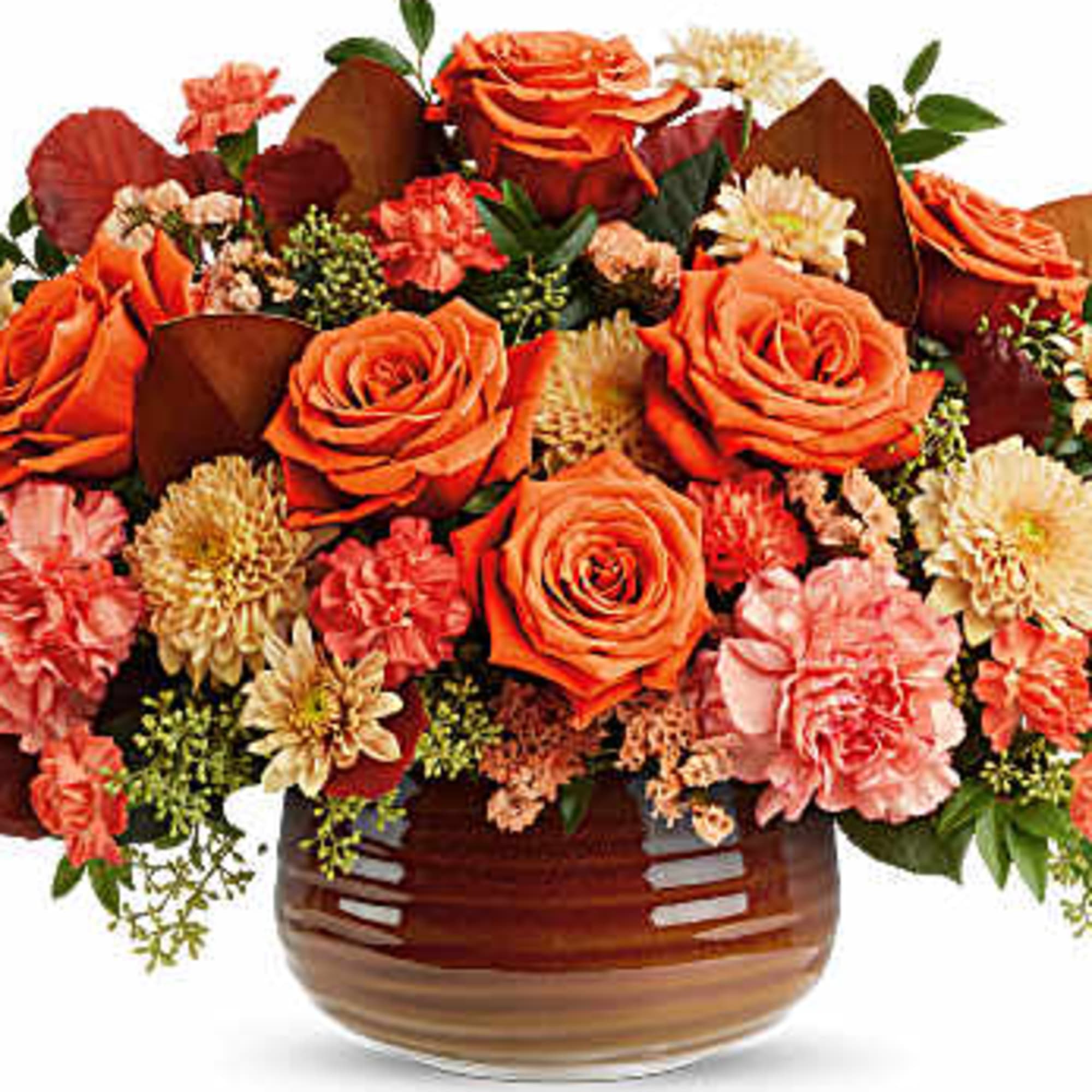 Orange roses and carnations arranged in a brown glass vase