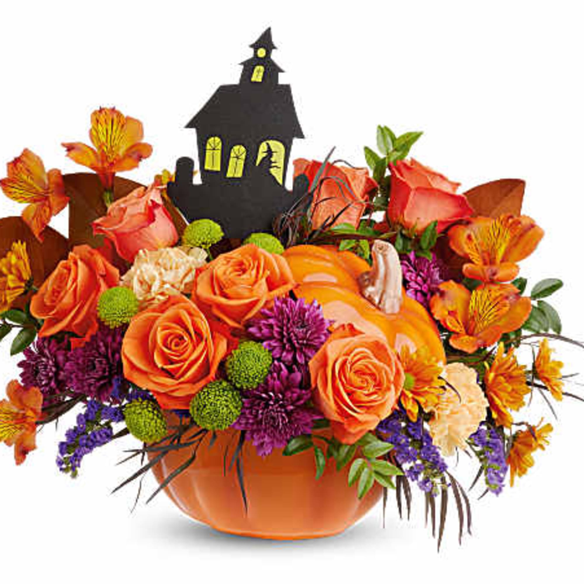 Orange roses in a pumpkin vase with a haunted house pick
