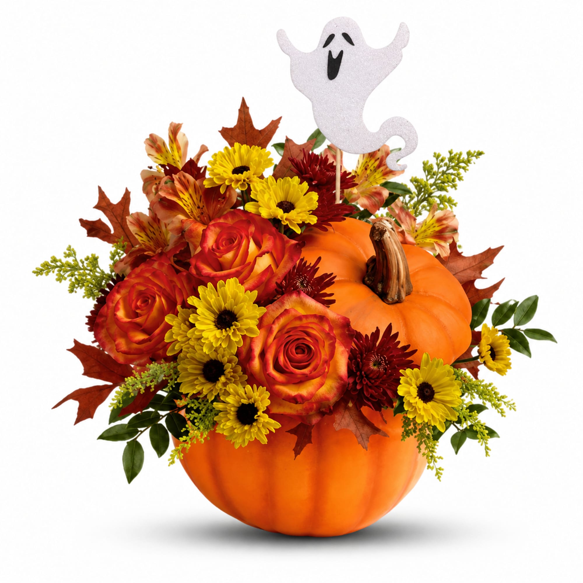 Pumpkin arrangement with roses, daisies, and a ghost topper