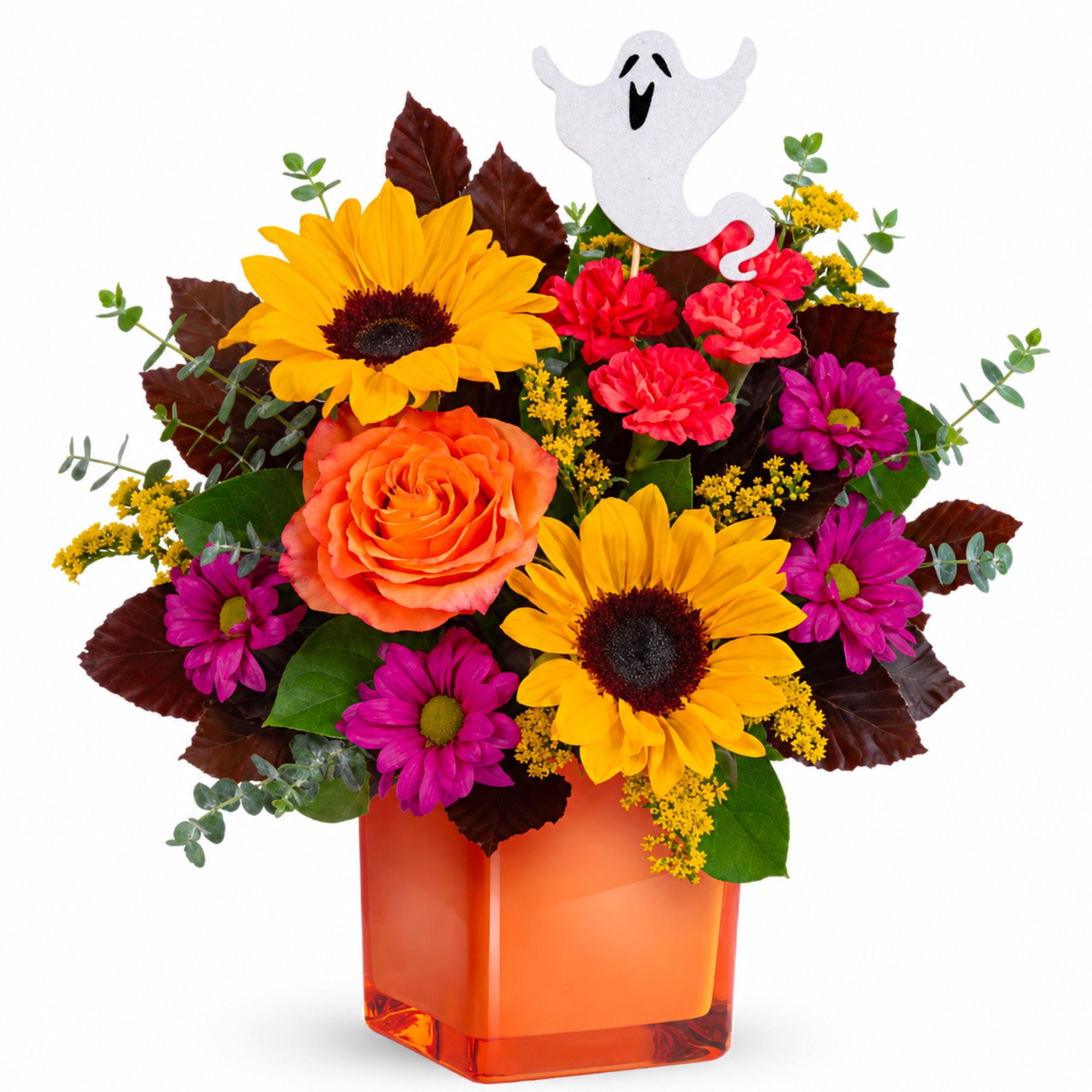 Bright mixed bouquet in an orange vase with a ghost pick
