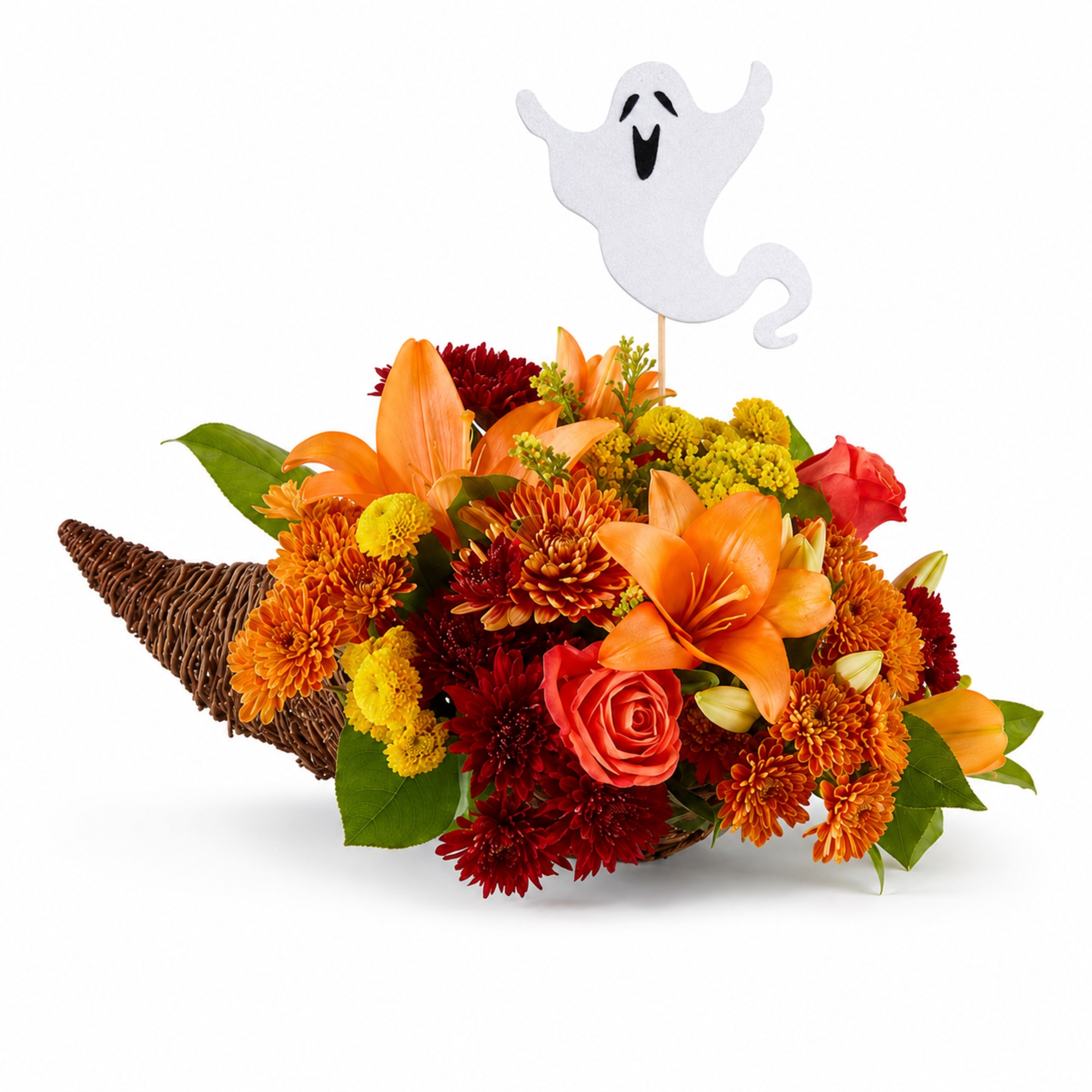 Orange and red flower arrangement in a wicker cone with a ghost pick
