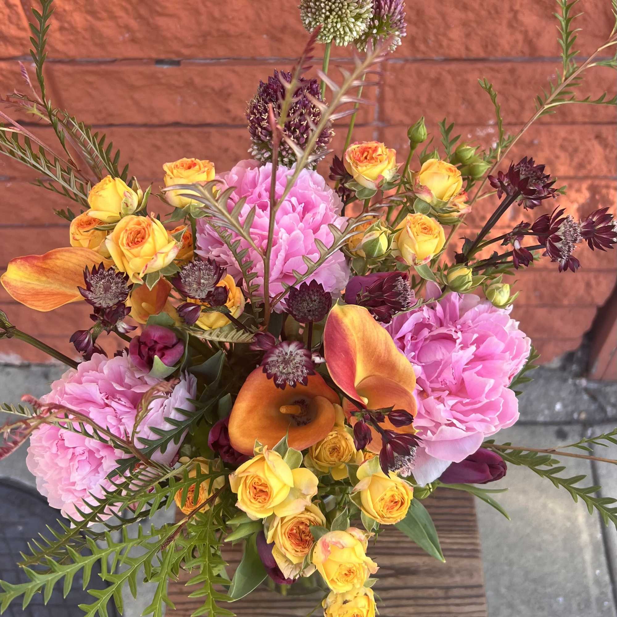 
A vibrant, garden-style arrangement bursting with color and texture. This bouquet features, photo 2 of 2