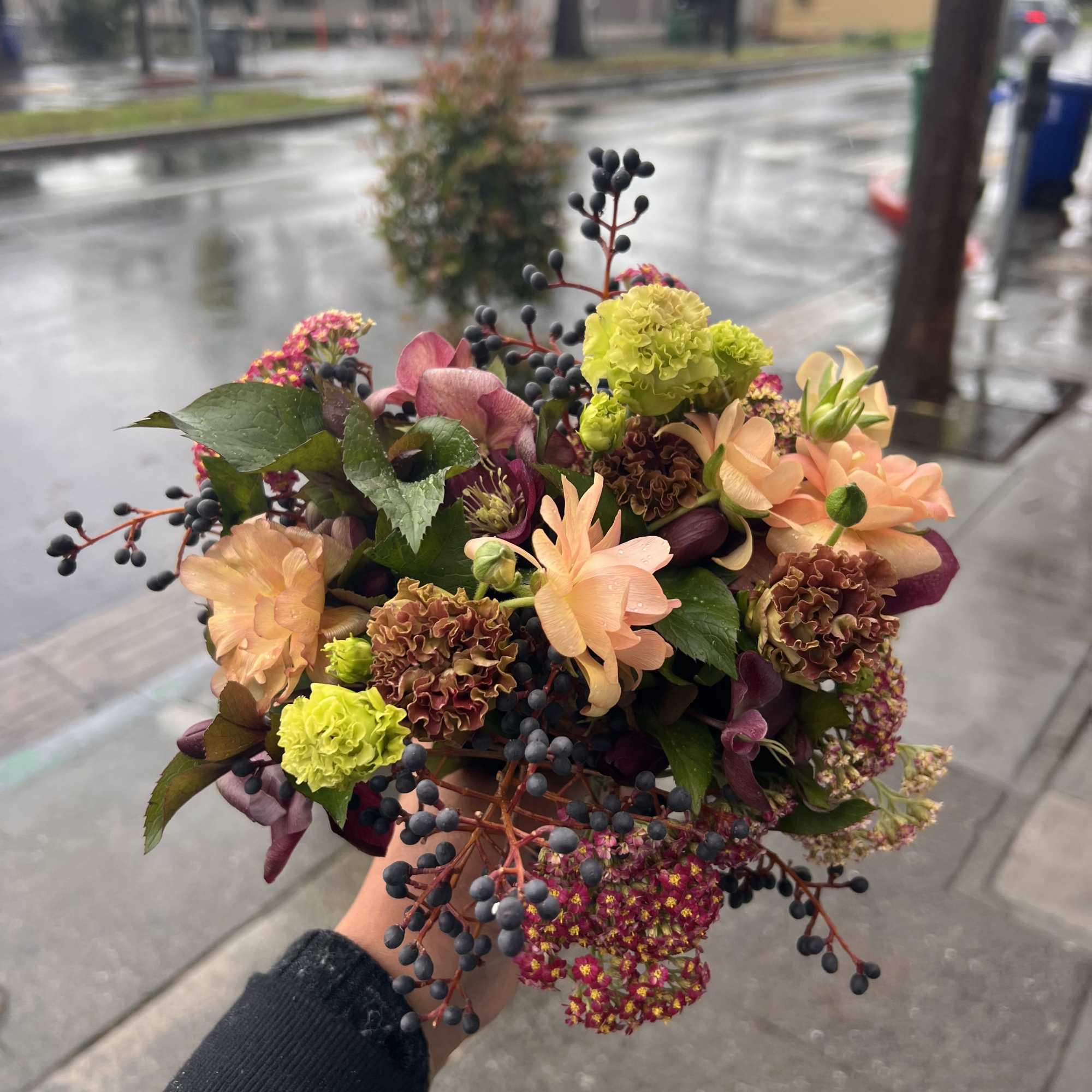 This bouquet carries warmth and resilience &mdash; soft peaches and honey tones
