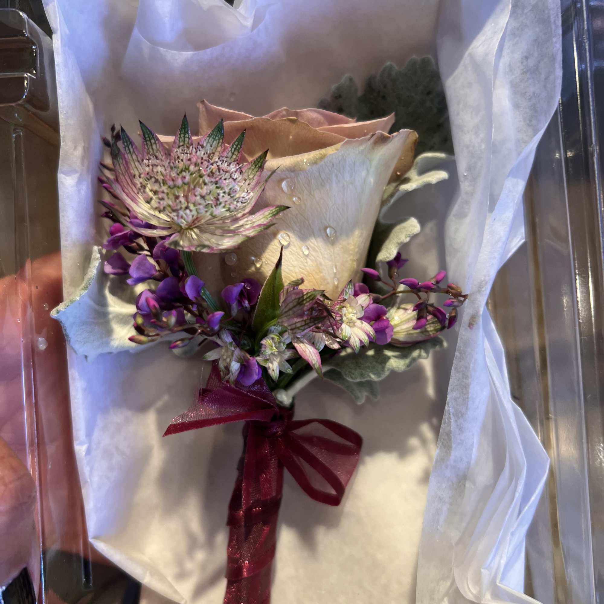 The Blush Whisper Boutonniere features a soft blush rose accented with delicate, photo 2 of 2