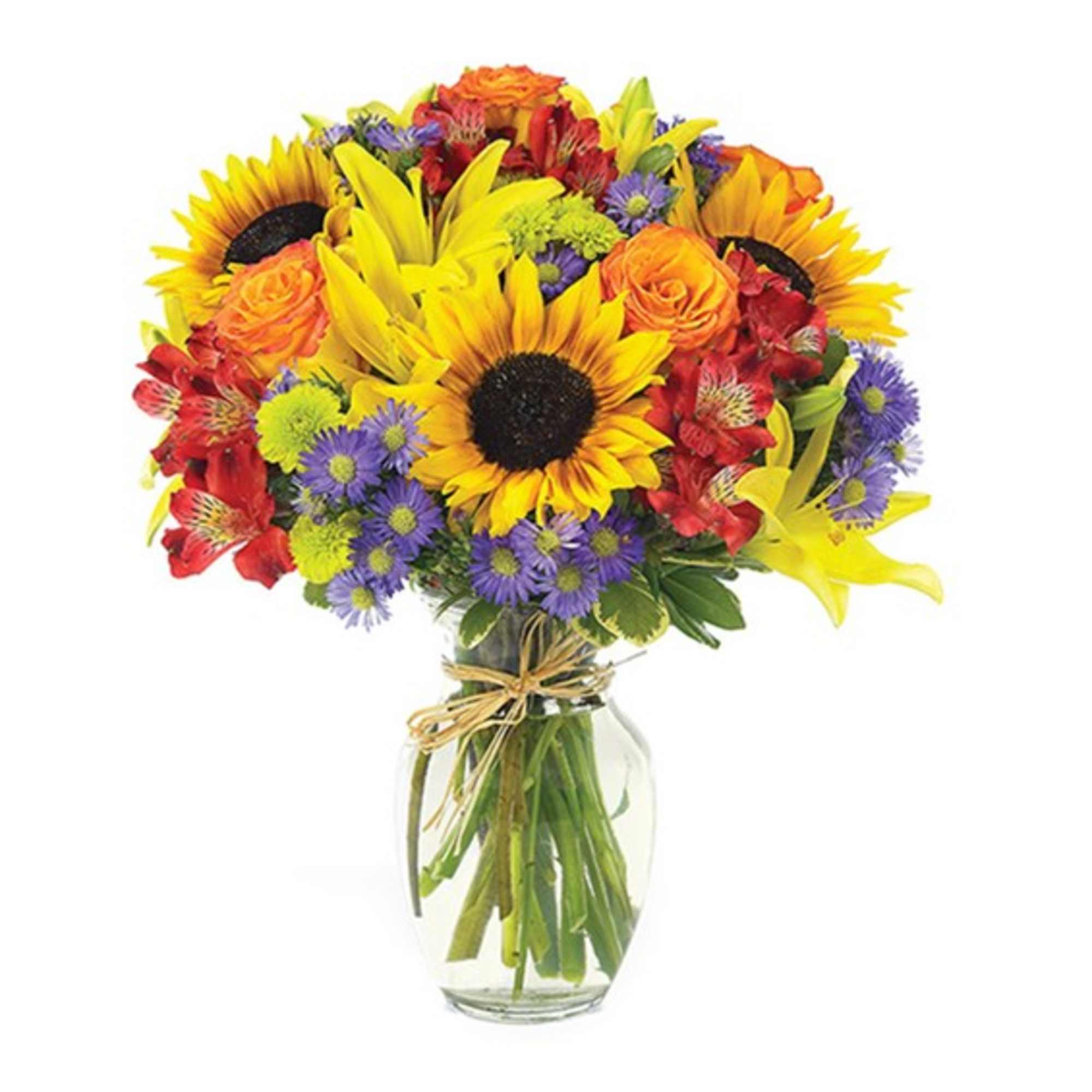 Bright mixed bouquet with sunflowers, roses, lilies, and purple daisies in a glass vase