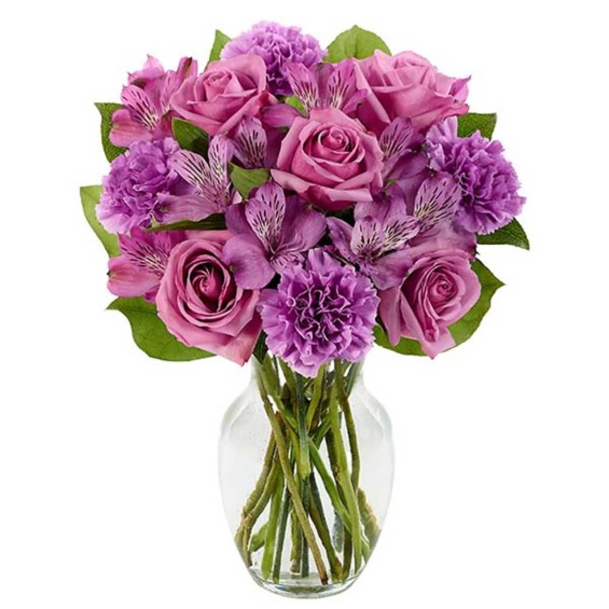 Pink and purple bouquet of roses and carnations in a clear glass vase