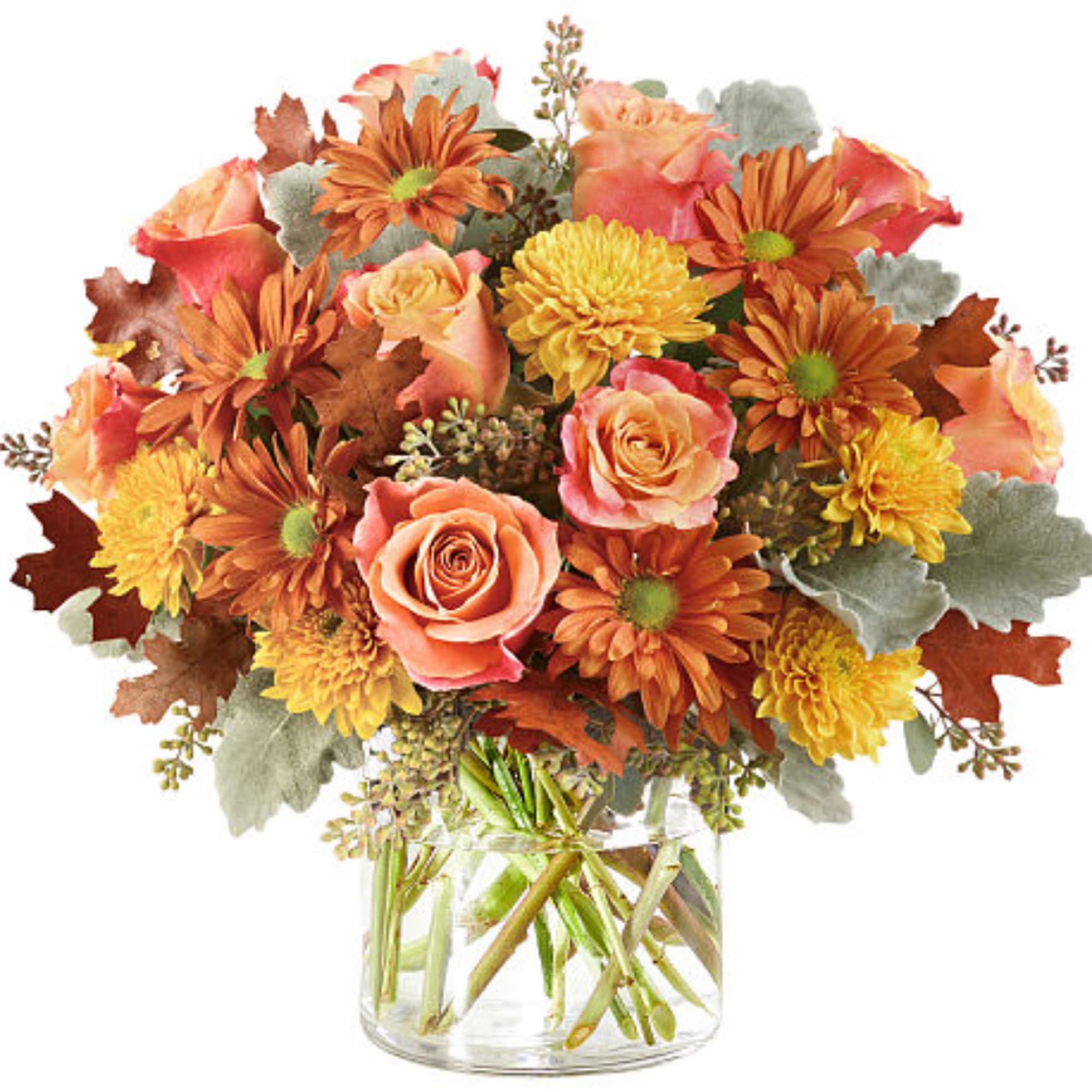 Bouquet of orange and pink flowers in a clear glass vase