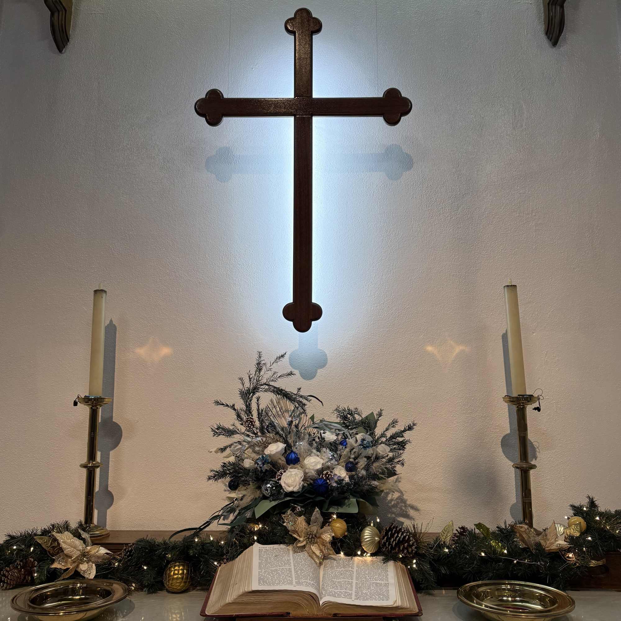This is a winter-themed artificial flower or eternal flower arrangement, which is