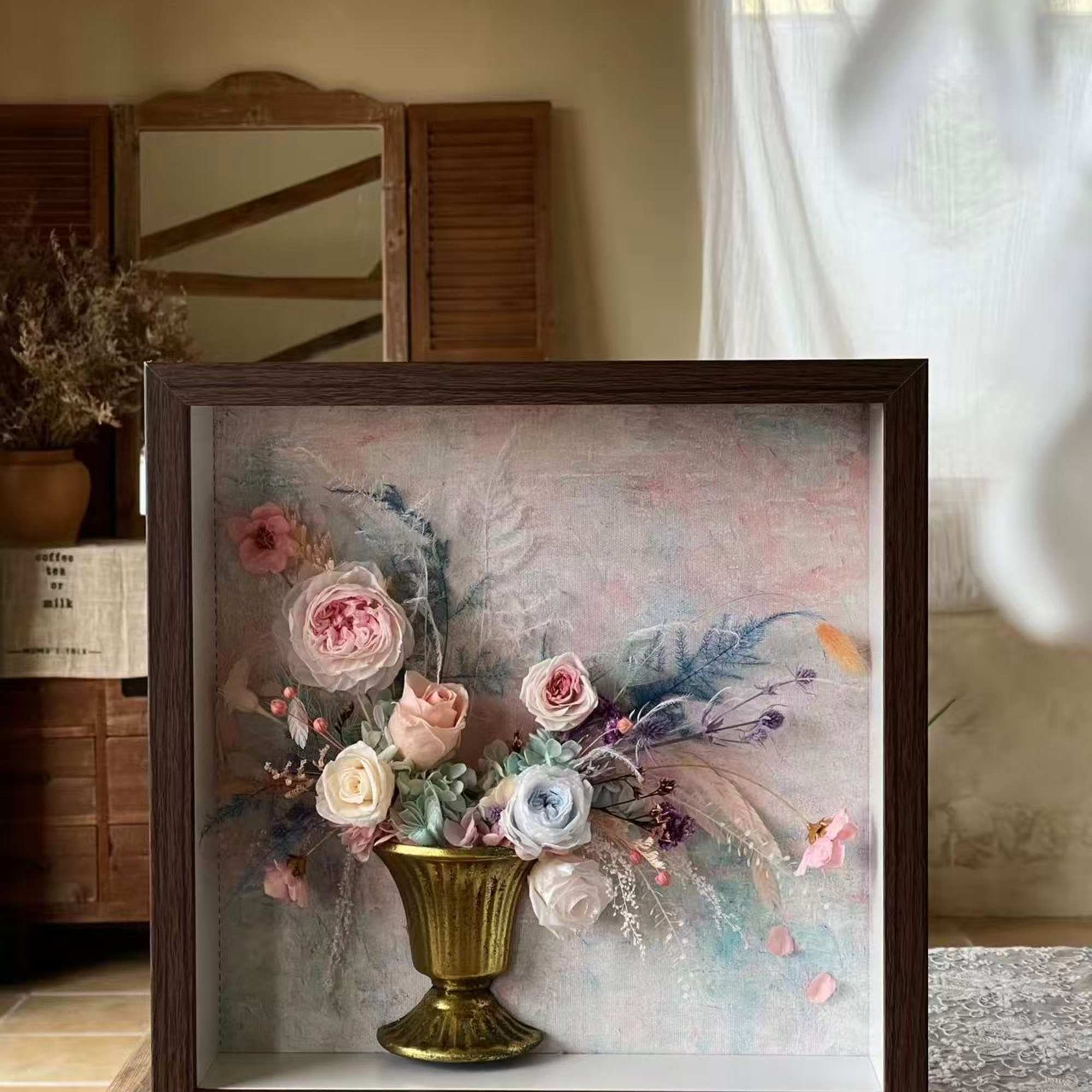 Framed floral arrangement with pastel roses in a gold vase, photo 2 of 2