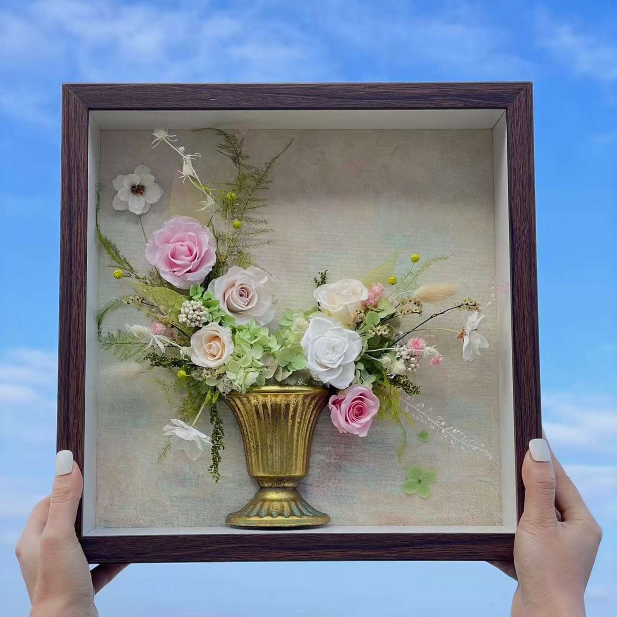 Framed floral arrangement with pink and white roses in a gold vase, photo 2 of 2