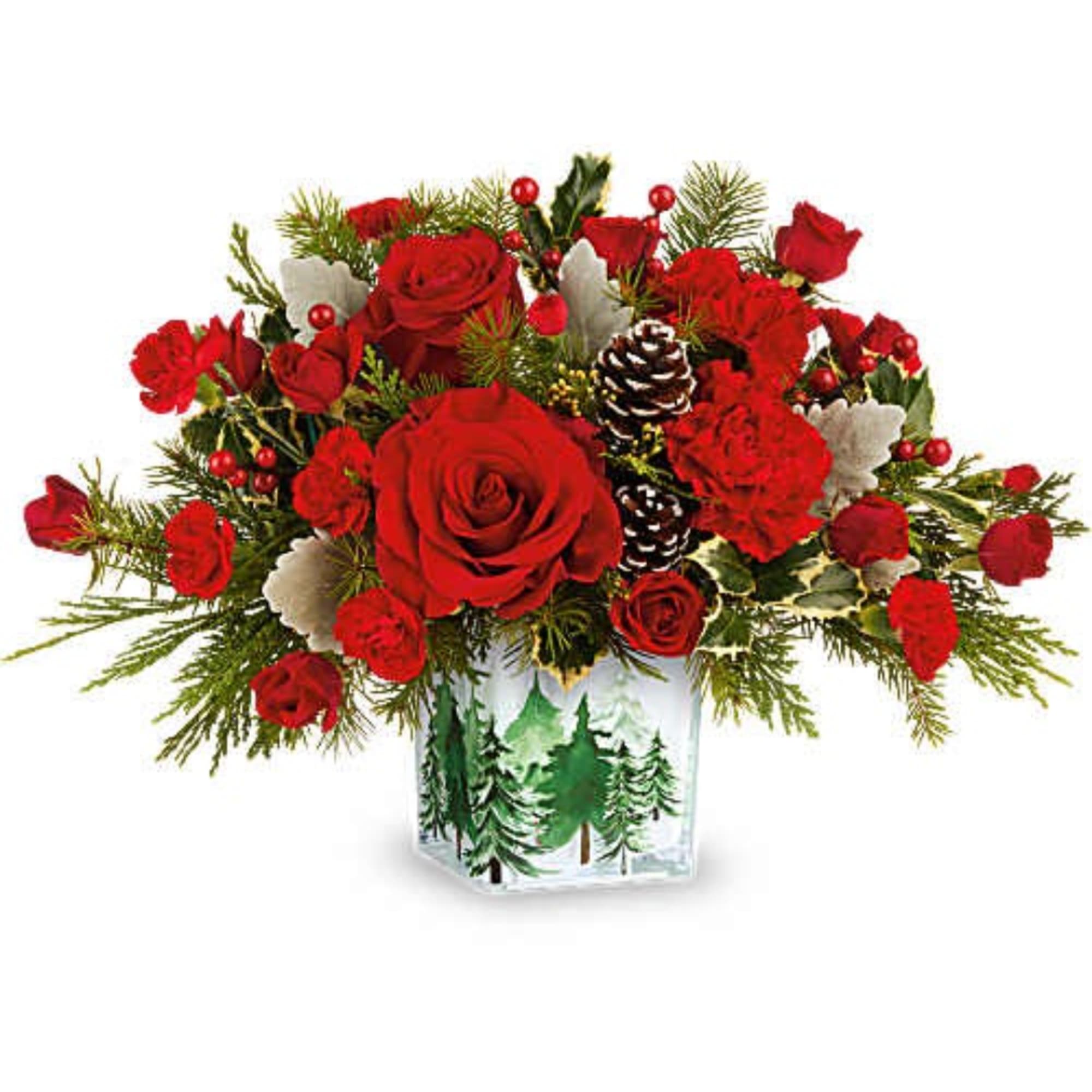 Red roses and carnations in a holiday vase with pinecones
