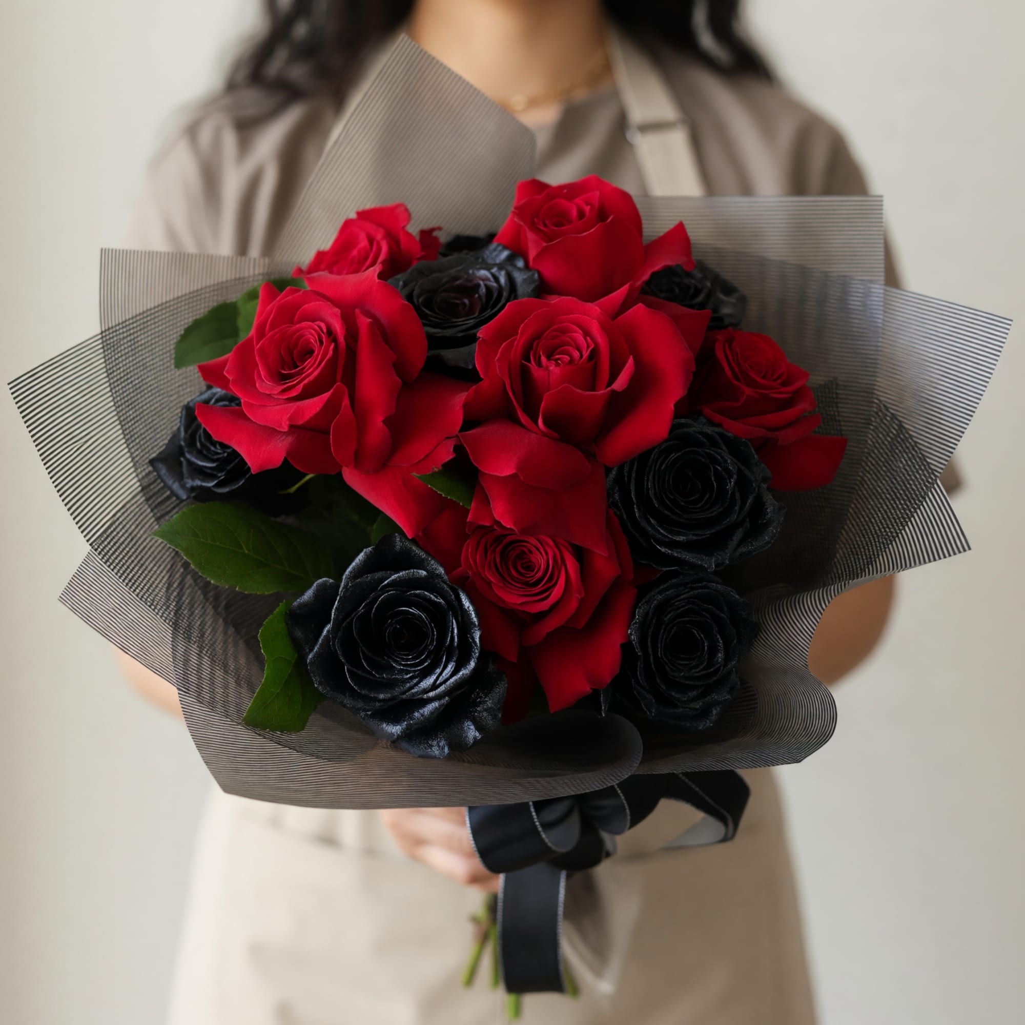 Dark Matter is a Halloween‑inspired flower arrangement that reads like a moody