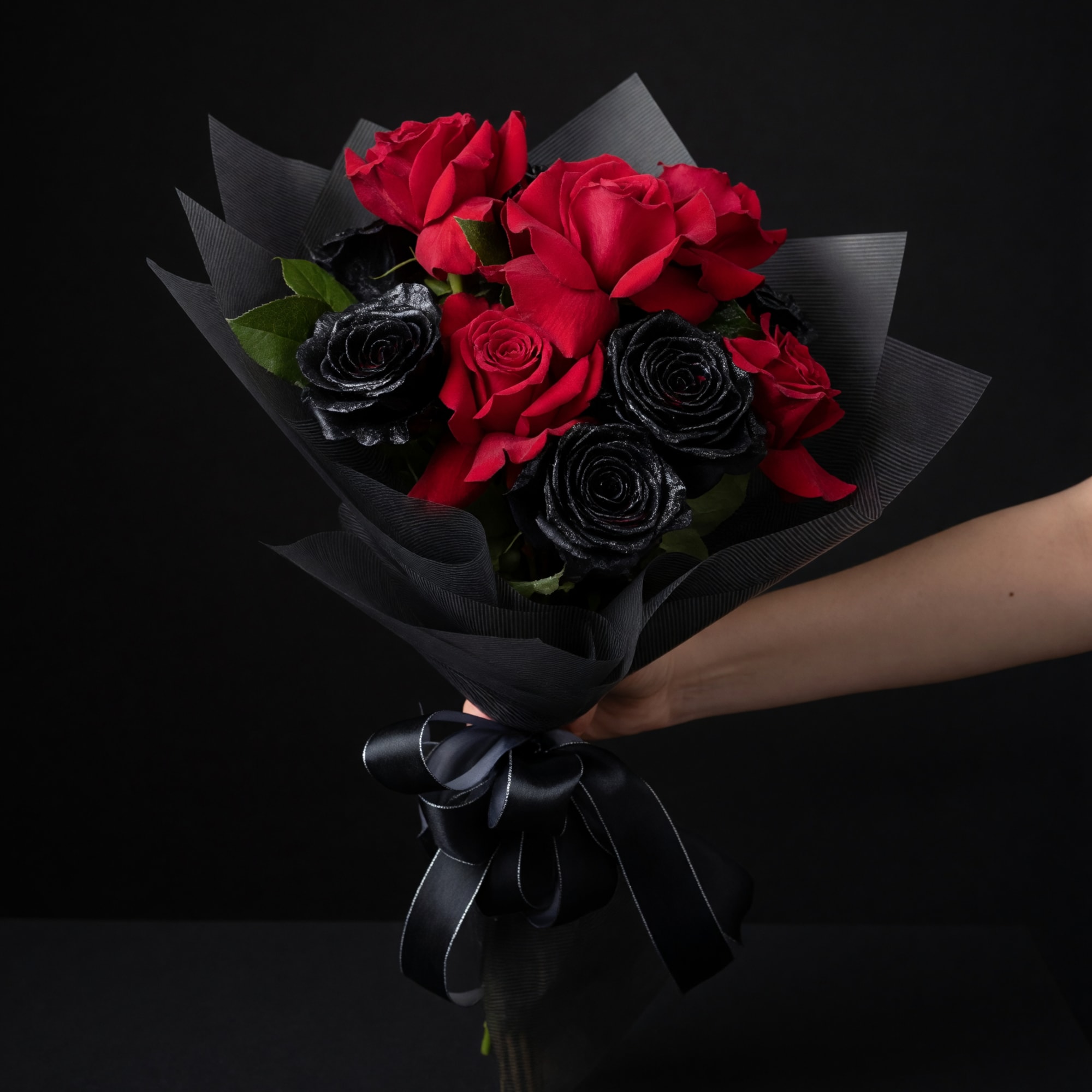 Dark Matter is a Halloween‑inspired flower arrangement that reads like a moody, photo 2 of 3