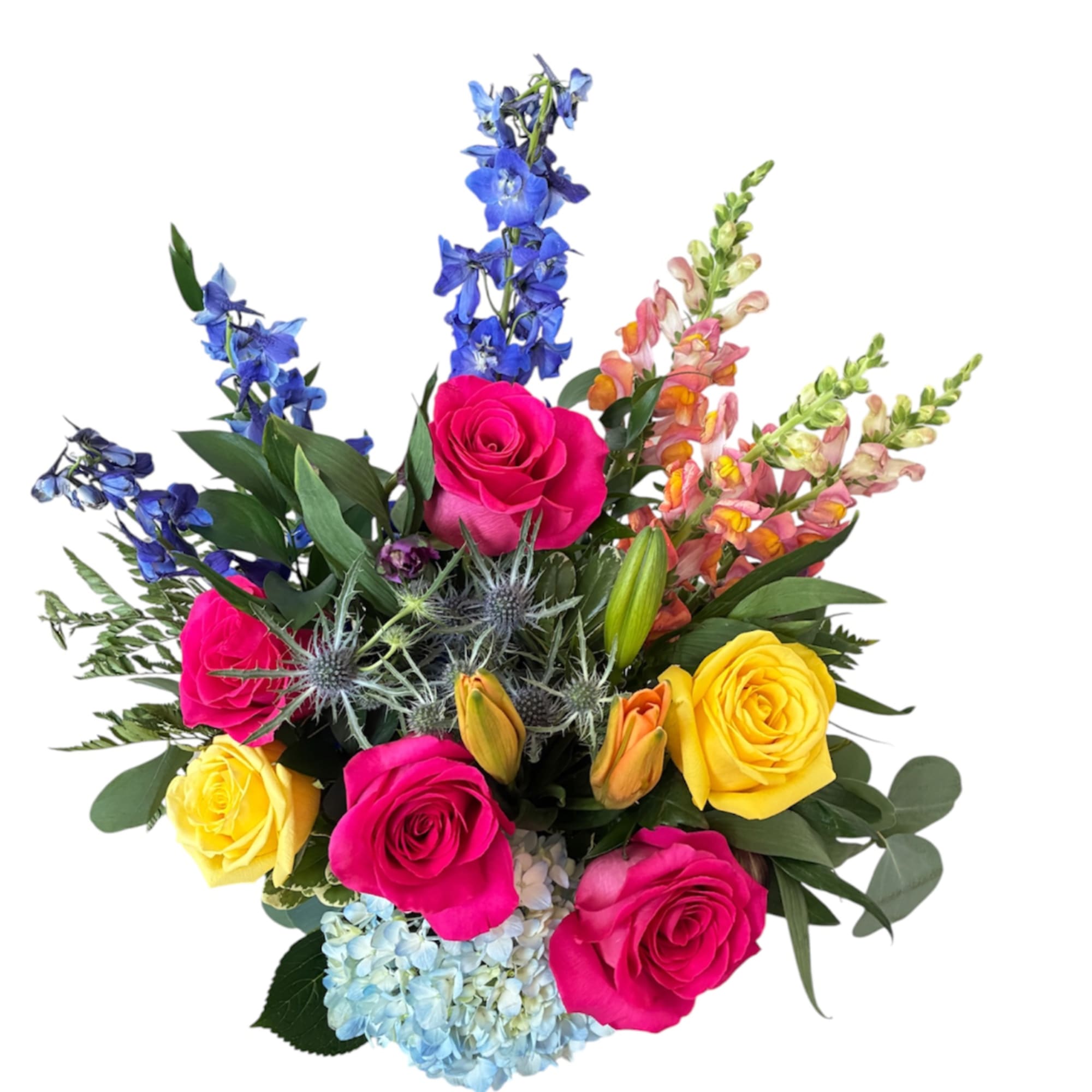 Bright mixed bouquet with roses, blue delphinium, and hydrangea