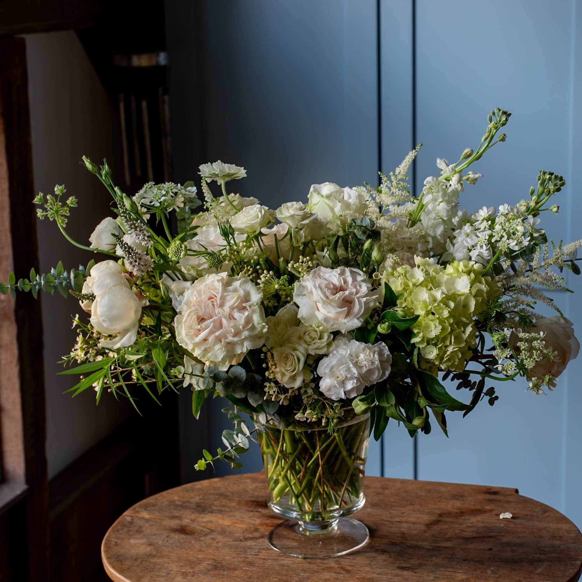 Beautiful roses, hydrangeas, stock, lisianthus all together create a timeless classic floral