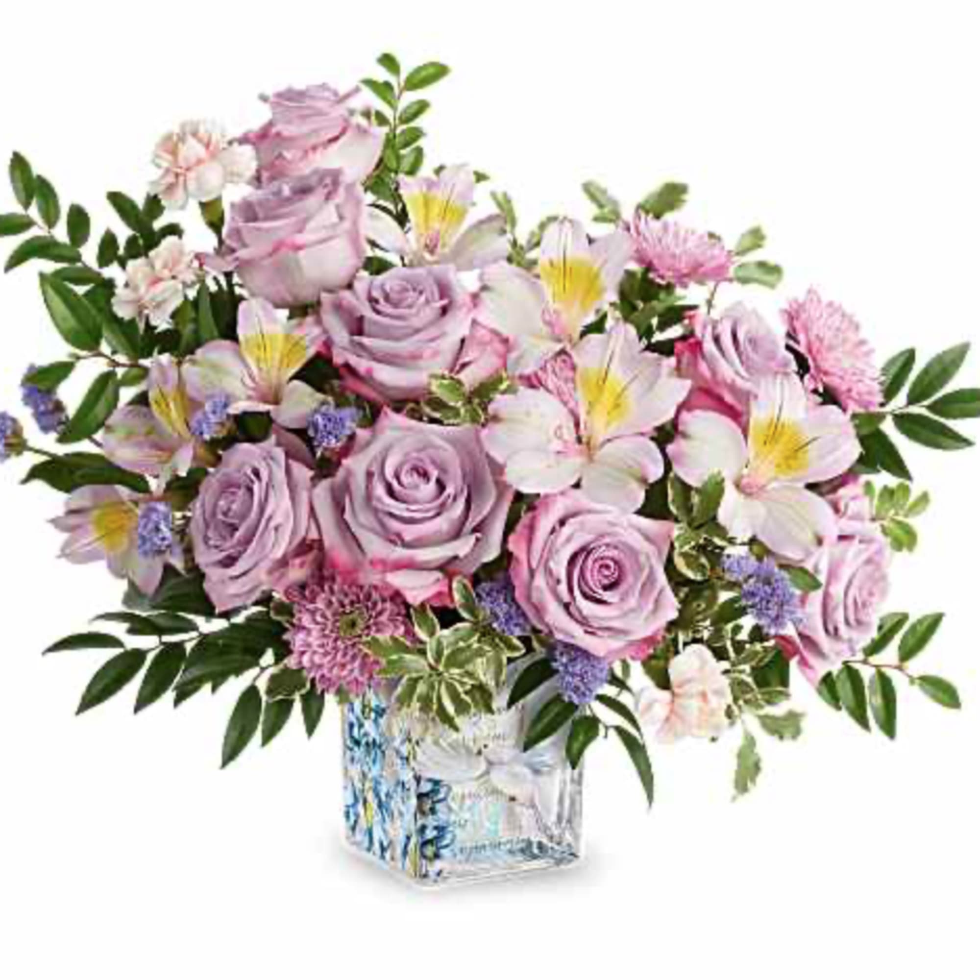 Peaceful and poetic, Written In The Sky Bouquet inspires serenity with lavender