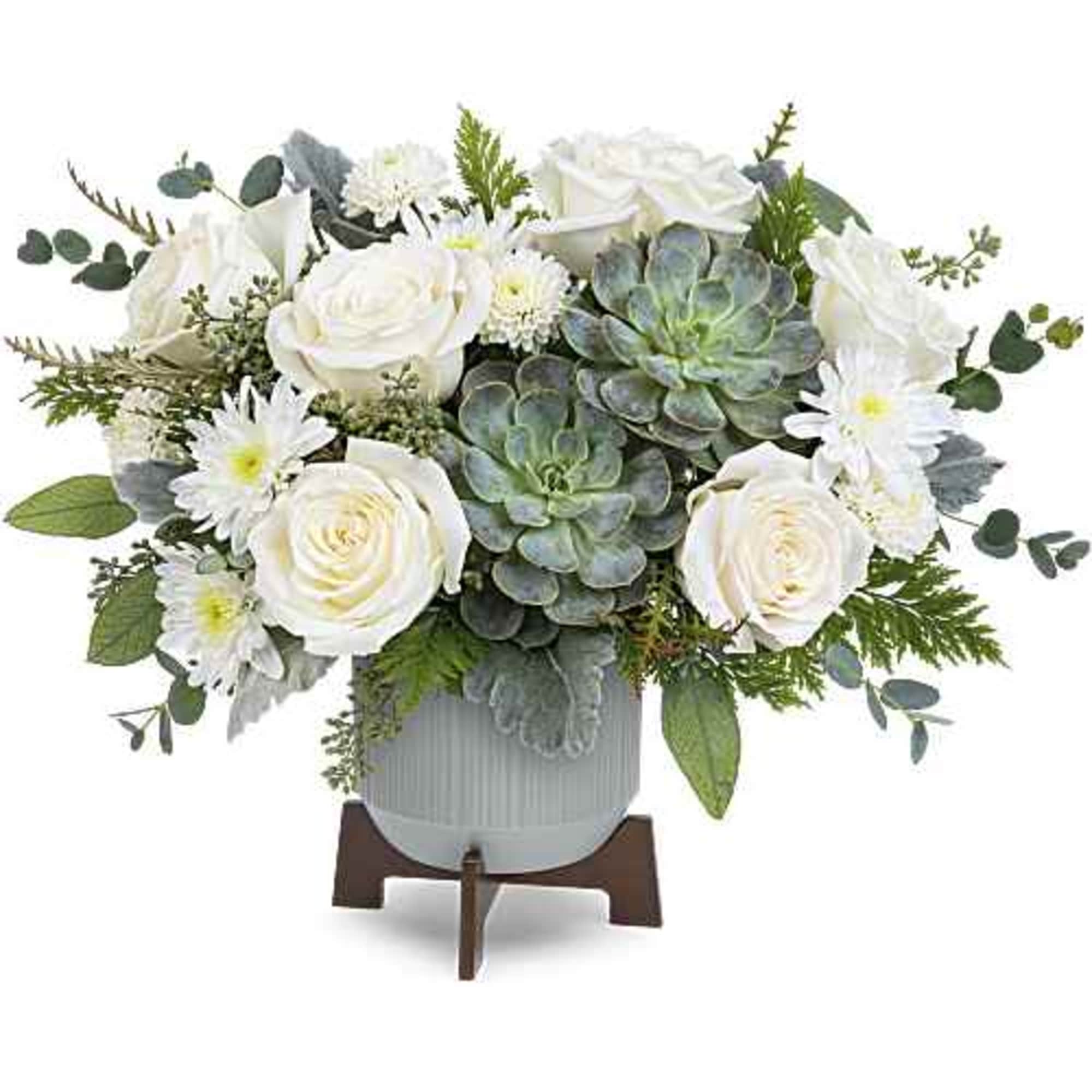 Inspired by tranquil clouds, this elegant bouquet of white blooms and varying